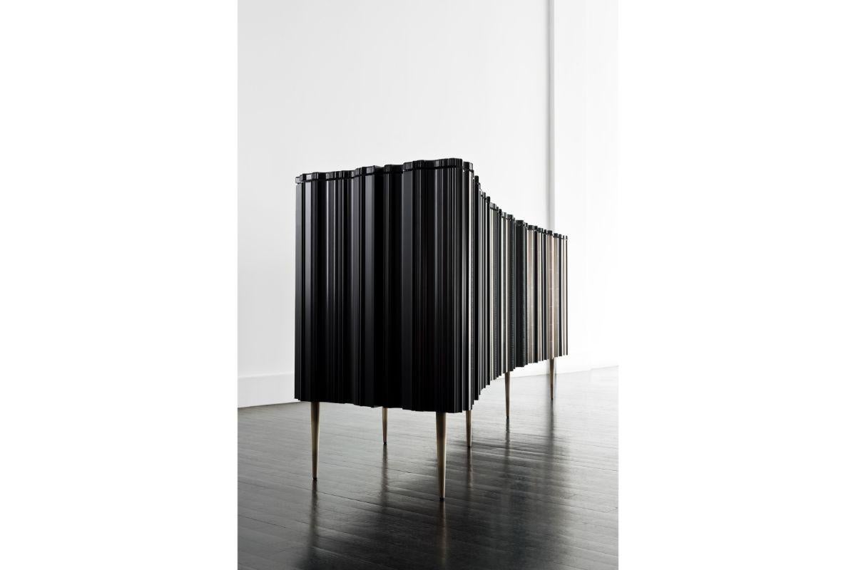 Frame curved sideboard by Luis Pons
Dimensions: W 251.5 x D 61 x H 107 cm
Materials: Metal, reclaimed wood, wood, applique, brushed, hand-crafted

Also available in different colors,

Fine crafted wood moldings are applied to the whole piece,