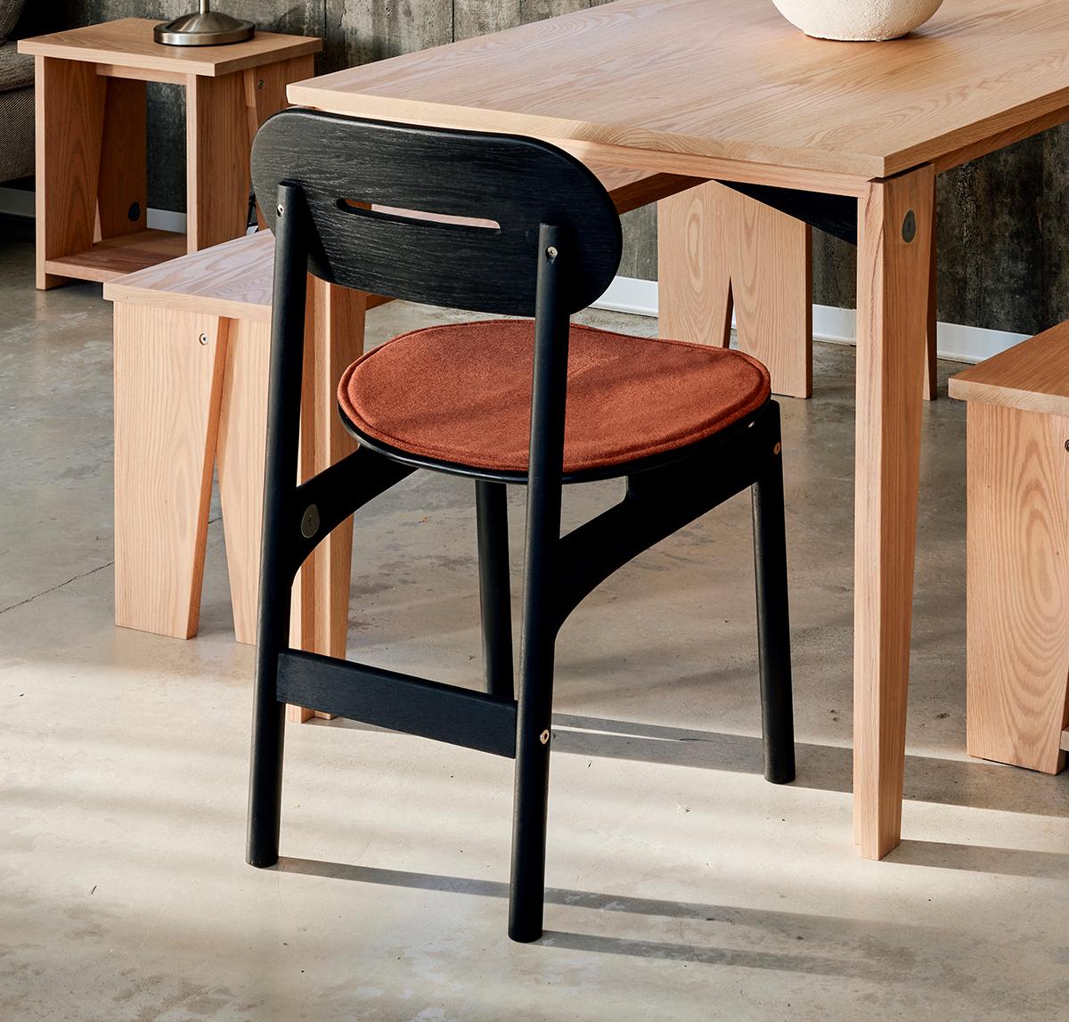 Frame Cushion Elliptical is a seating pad characterized by a simple geometric form.

It presents a comfortable experience by creating a pouf-like feeling for those who sit on it. Thin yet soft, it provides ease of movement with the anti-slip texture