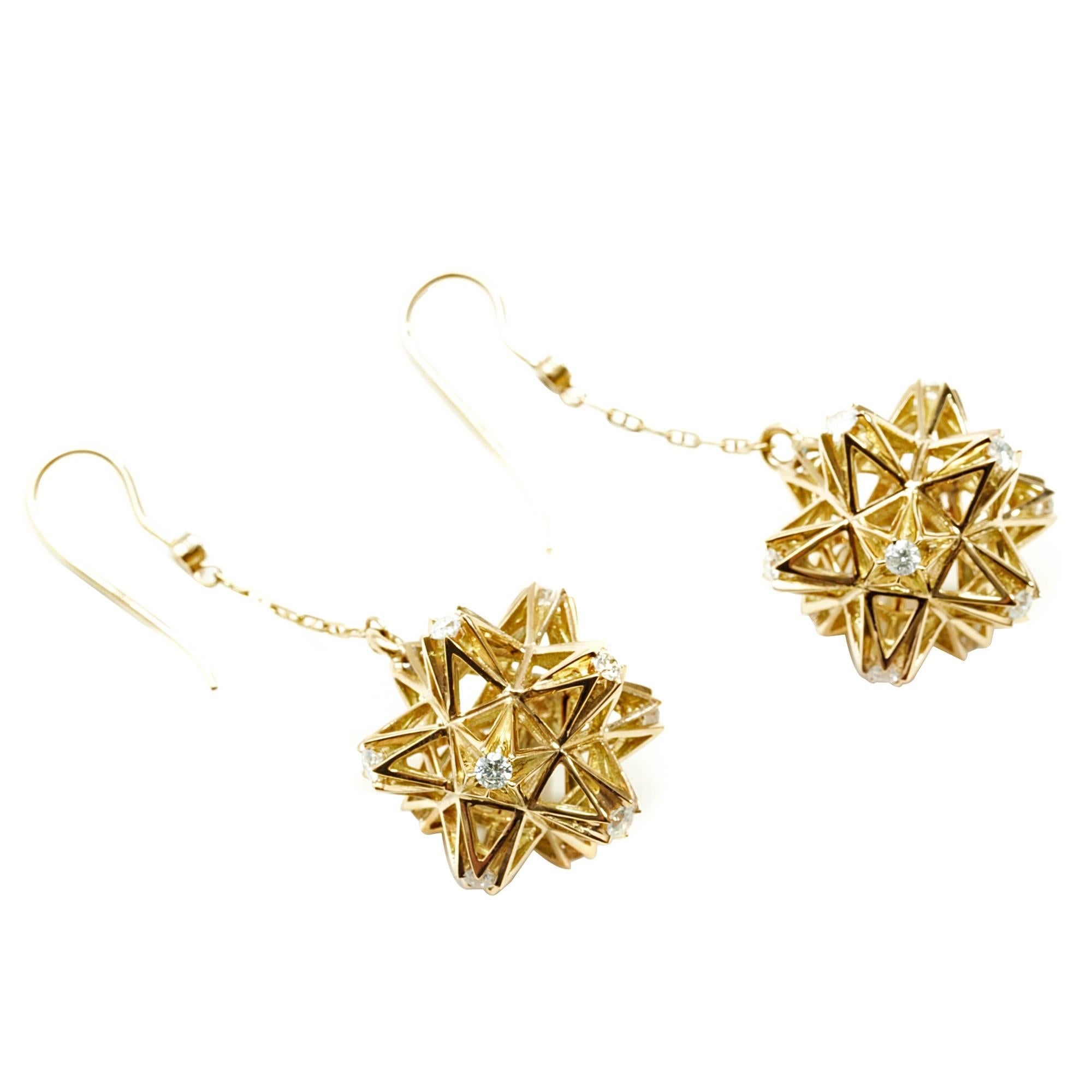 These limited edition earrings are inspired by sacred geometries and represent an exploding star. The tetrahedral form with exploded tips represents breaking away from old conditioned structure to reveal an empowered future. These Verahedra