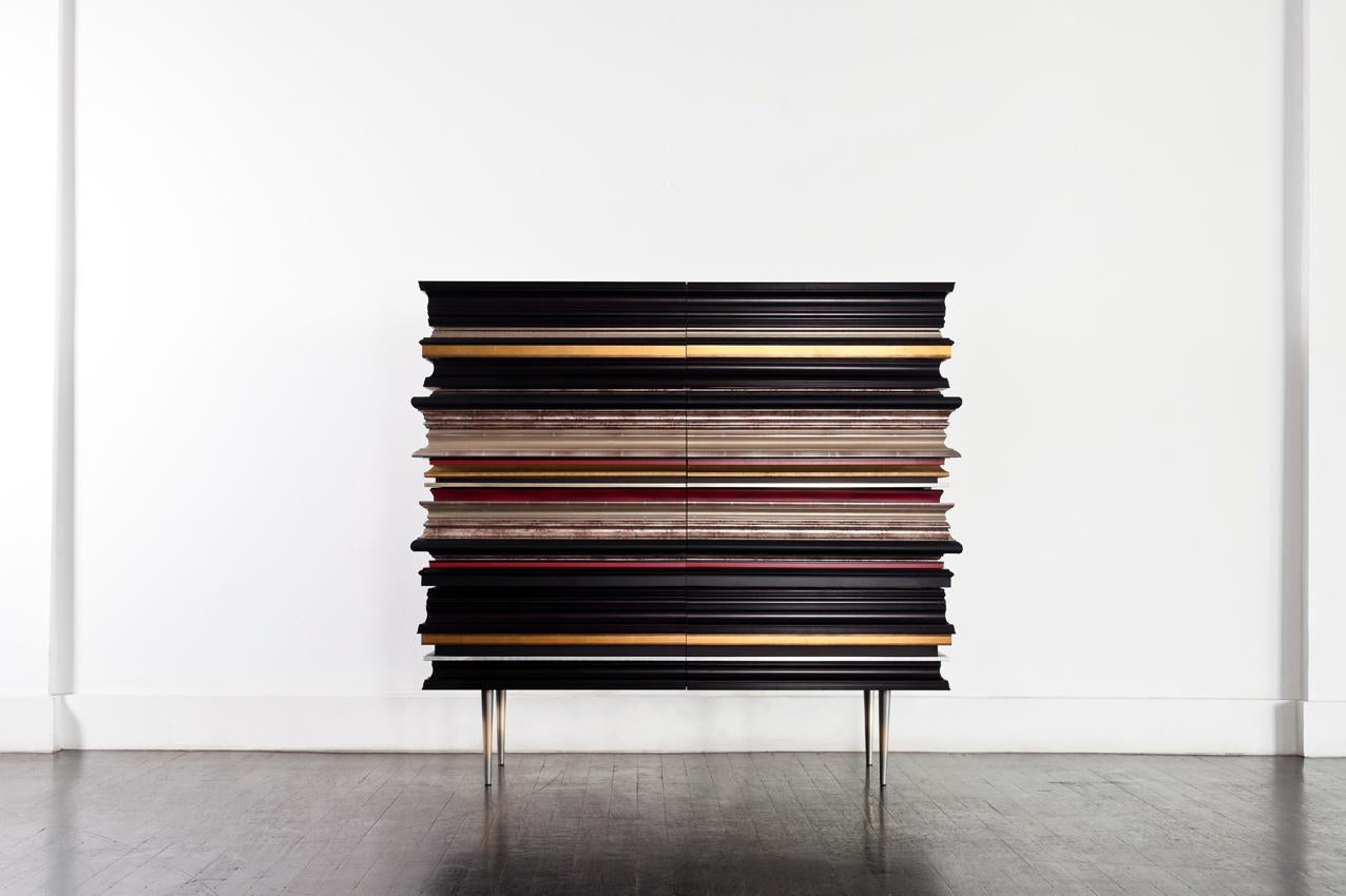 Frame dresser red by Luis Pons
Dimensions: W 91.5 x D 53.5 x H 112 cm
Materials: Metal, wood, bronzed, hand-crafted

Also available in different colors

Fine crafted wood moldings are applied to the whole piece, concealing drawers and acting