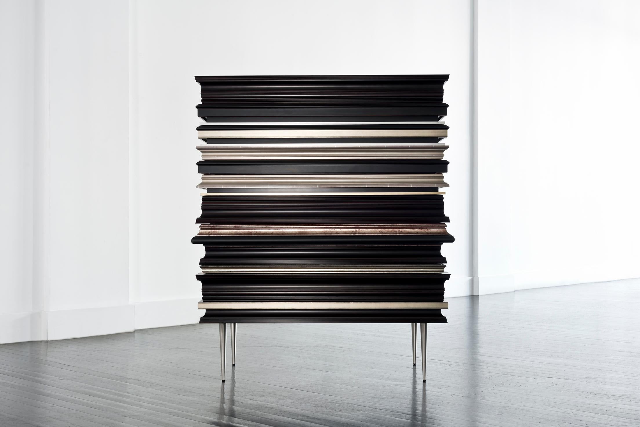 Frame dresser silver by Luis Pons
Dimensions: W 91.5 x D 53.5 x H 112 cm
Materials: Metal, wood, bronzed, hand-crafted

Also available in different colors

Fine crafted wood moldings are applied to the whole piece, concealing drawers and