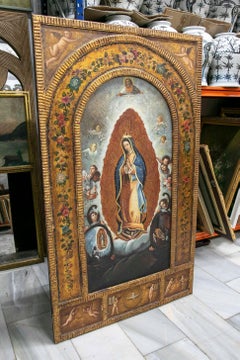 Marco sobre un panel de madera Virgen de Guadalupe con un dorado pintado