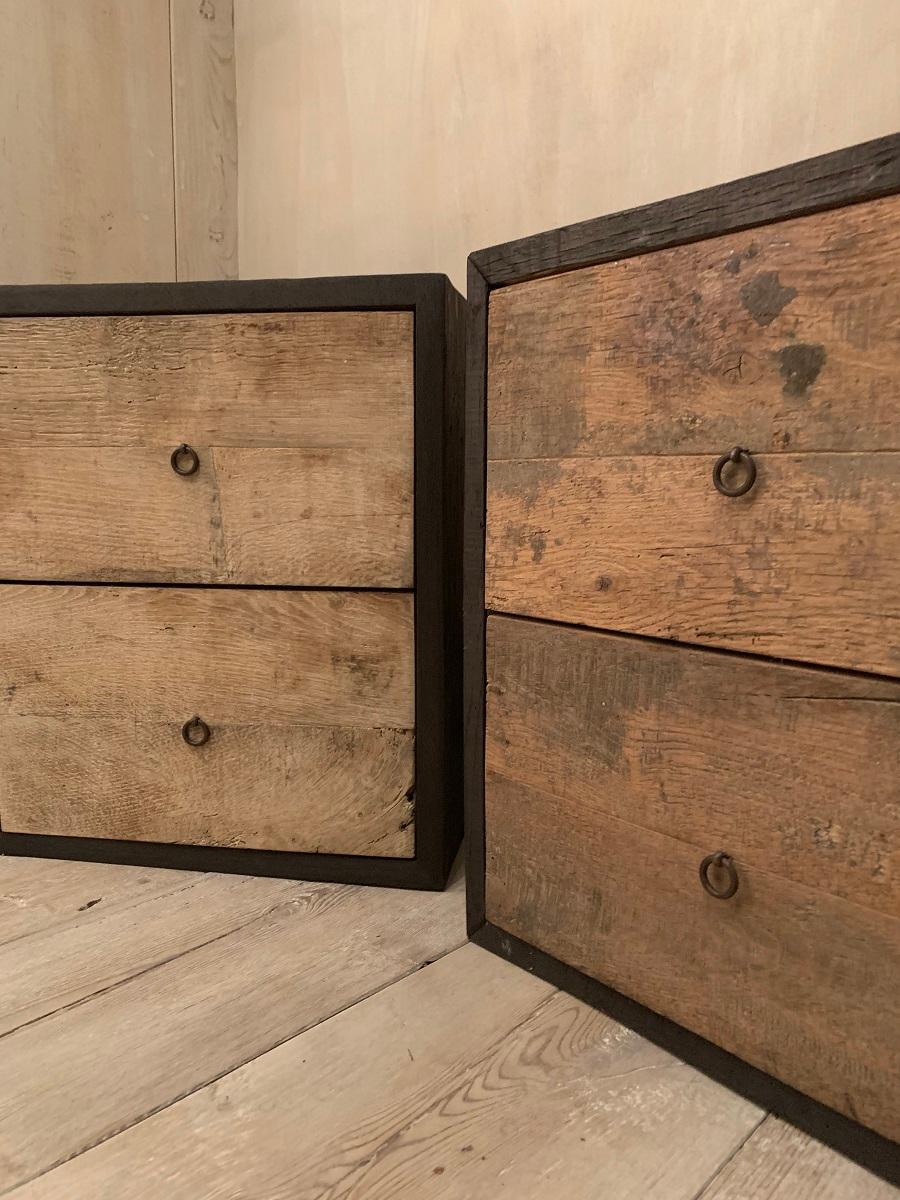 A pair of nightstands, model FRAME, completely made of 18th century French oak wainscot. Except the drawer fronts in natural patina stained in burned black.
