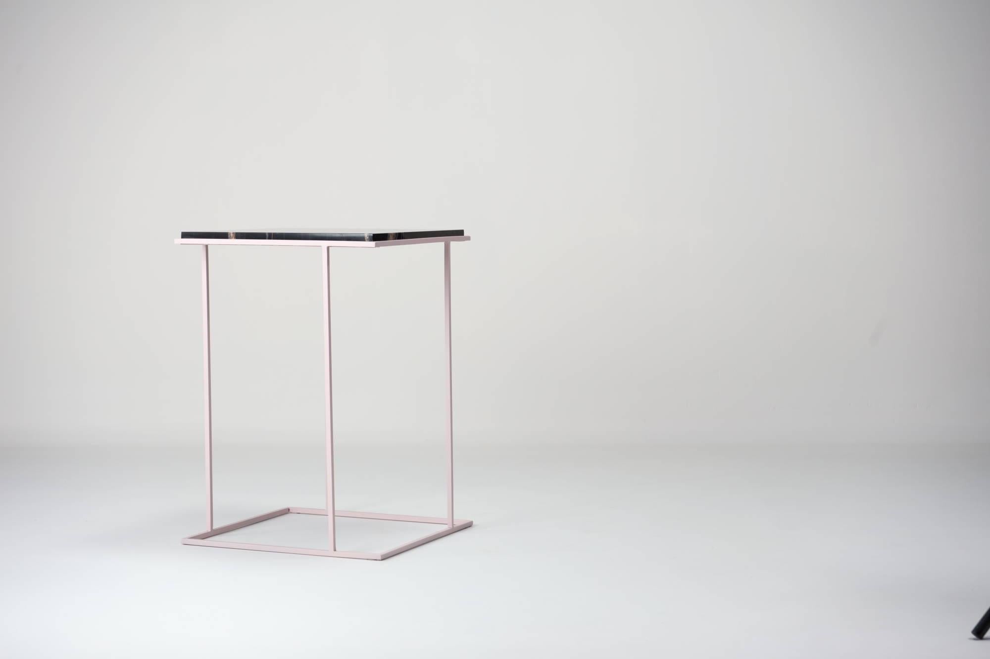 Elevate your interior with FramE, a side table that masterfully combines art and utility. Designed to showcase the unparalleled beauty of its marble or stone top, FramE transforms functional furniture into a statement of sophistication.

The table’s