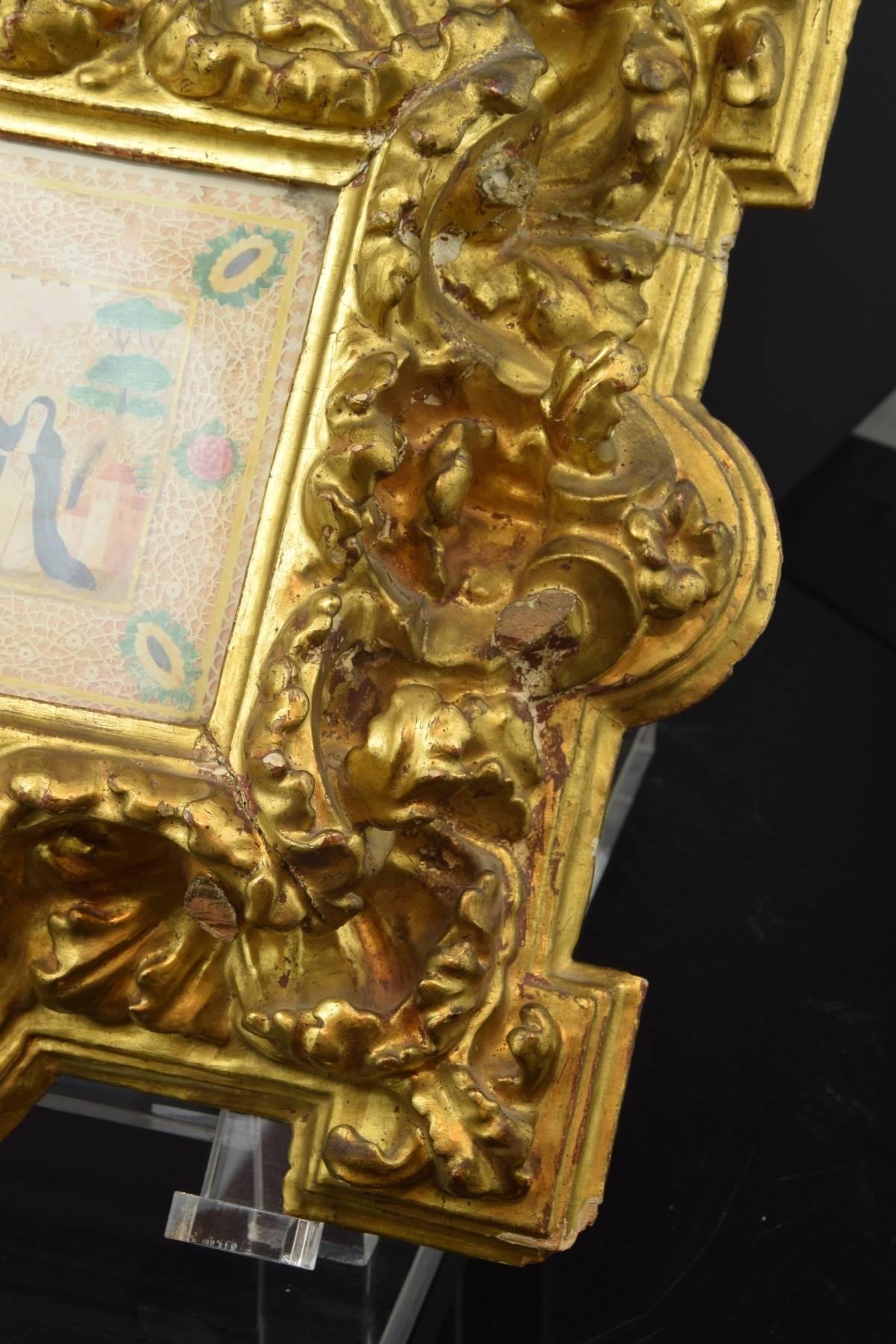 Carved and gilded frame with painting on vellum, 