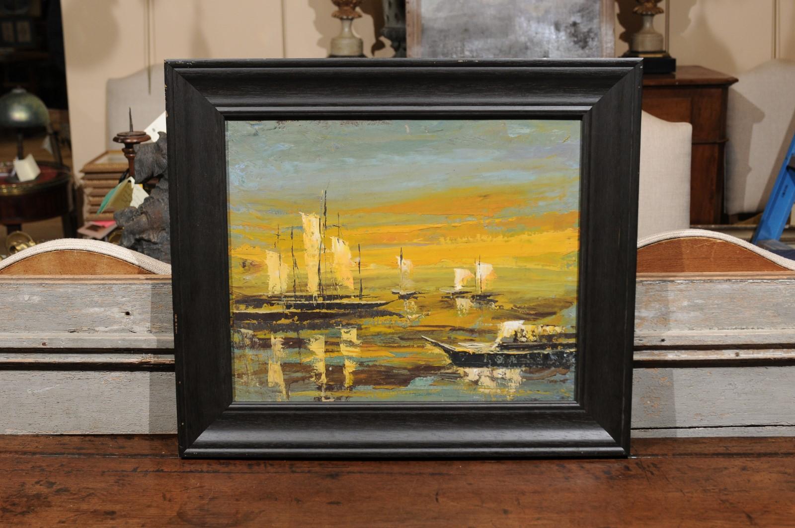 20th century oil on canvas seascape painting in blues and yellows with sailboats, in black painted frame.