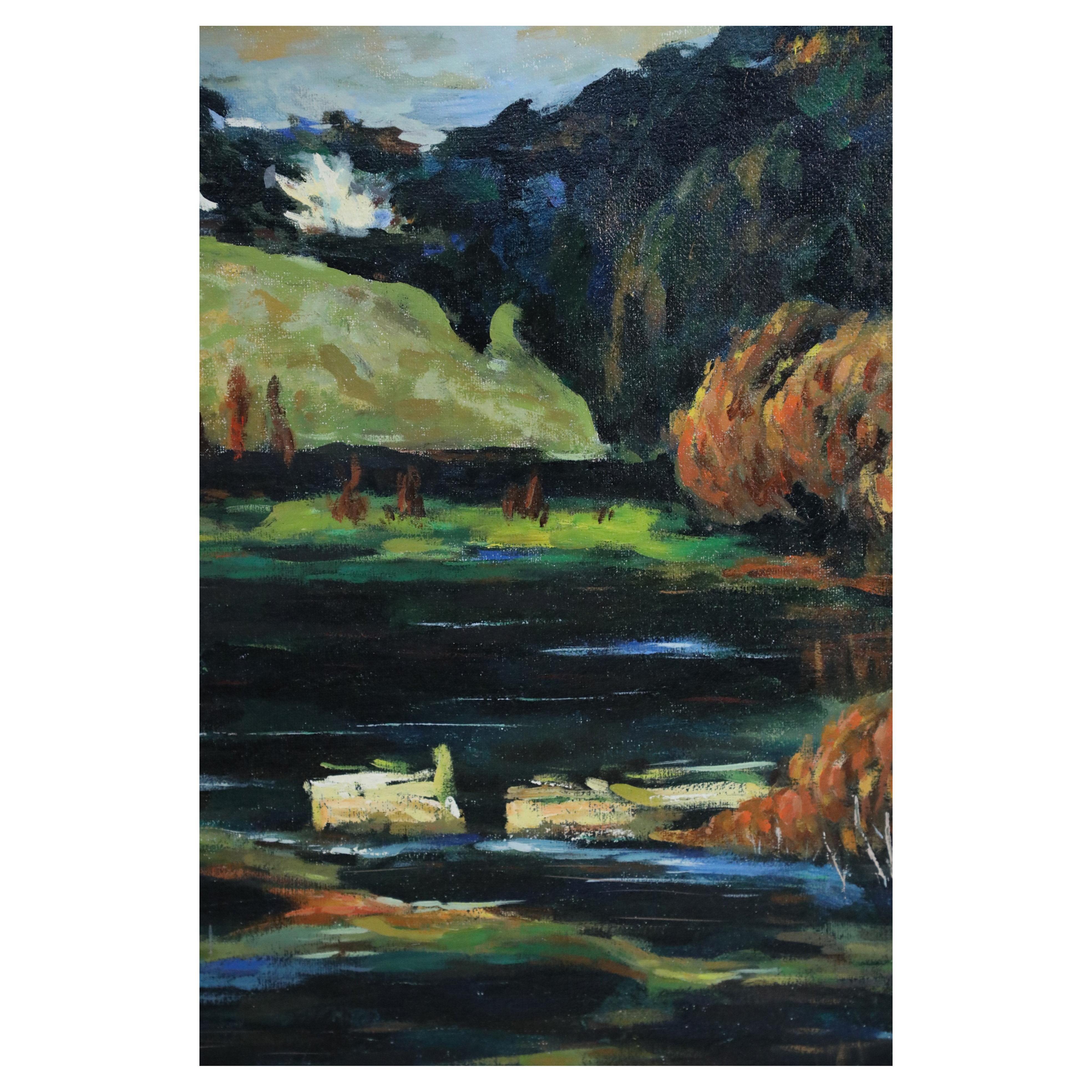 Peinture de paysage encadrée à l'acrylique représentant des immeubles de bord de lac à l'automne