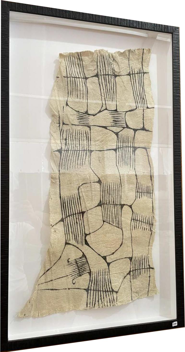 Material: Frame- newly framed with black etched wood and glass.
This barkcloth is made in Africa by beating sodden strips of the
fibrous inner bark of trees into sheets, which are then finished into a
variety of items such as these art prints.