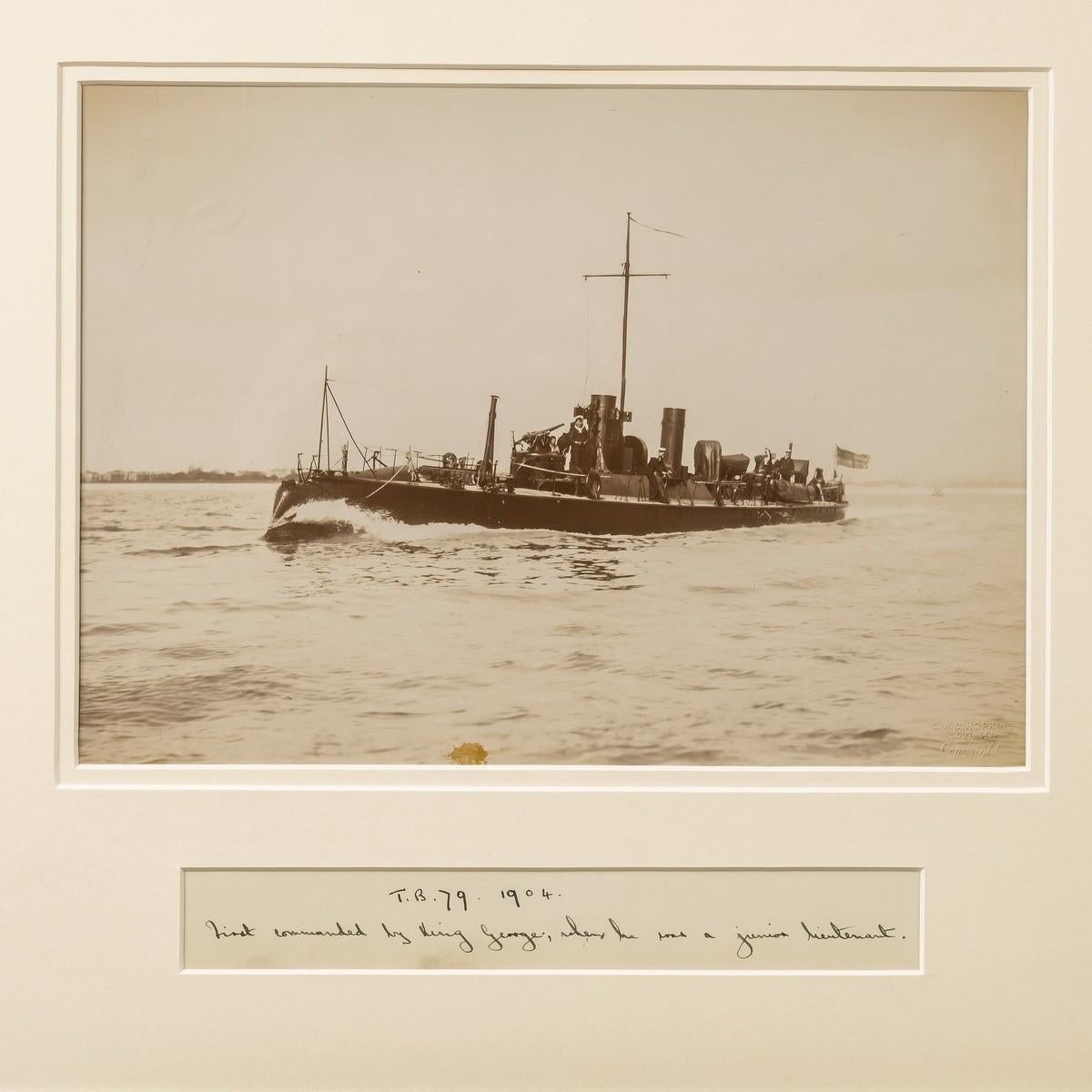 A rare framed albumen photograph of the Royal Navy Torpedo boat no 79. Inscribed on card as being commanded by the Future King George V.