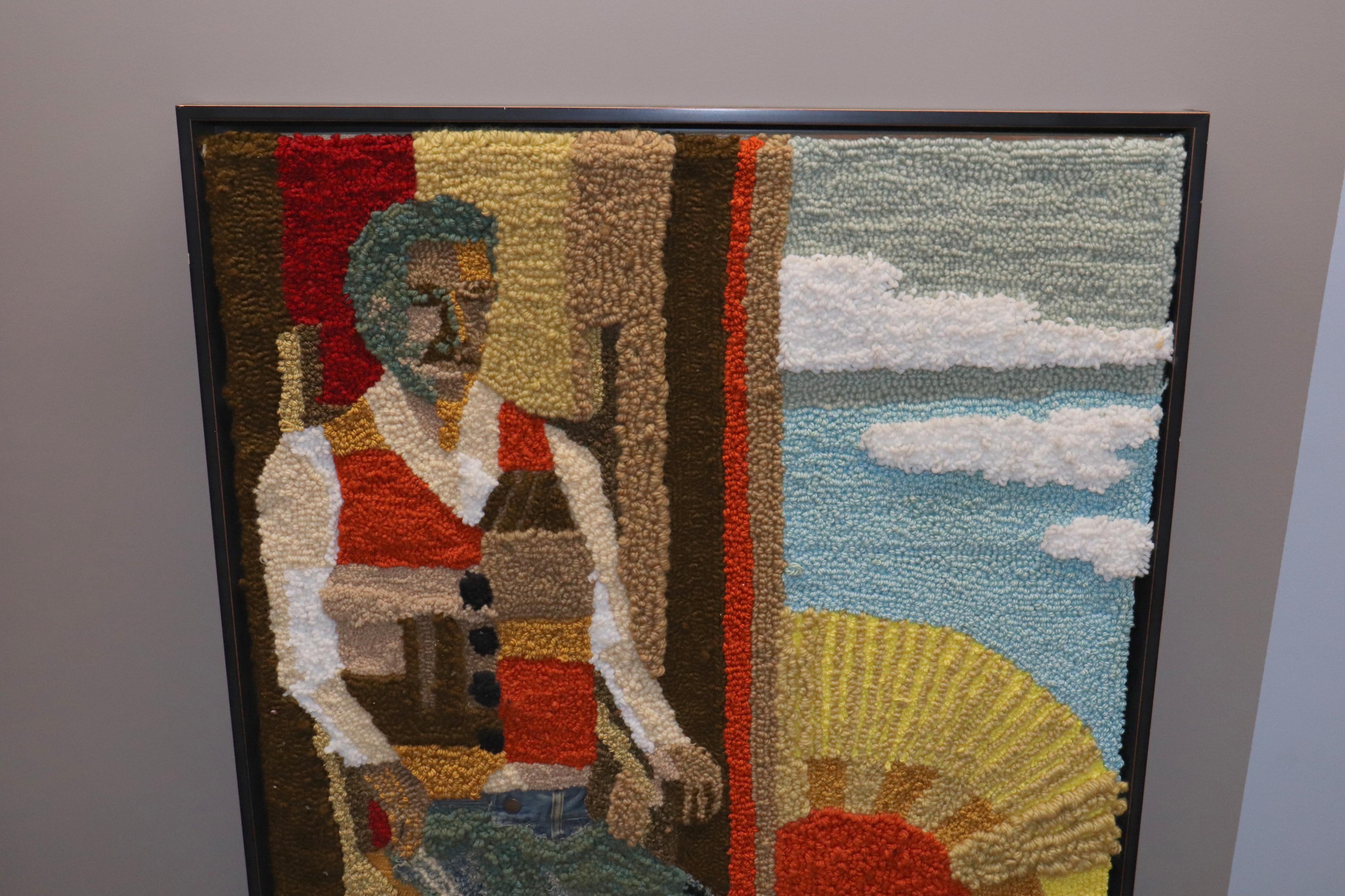 An American hooked rug mounted on a large frame with a man sitting on a chair. the material used on his pants are from raw denim jeans. Creative technique used by weaver. This piece can only be used as a wall hanging.

measures: 2'8
