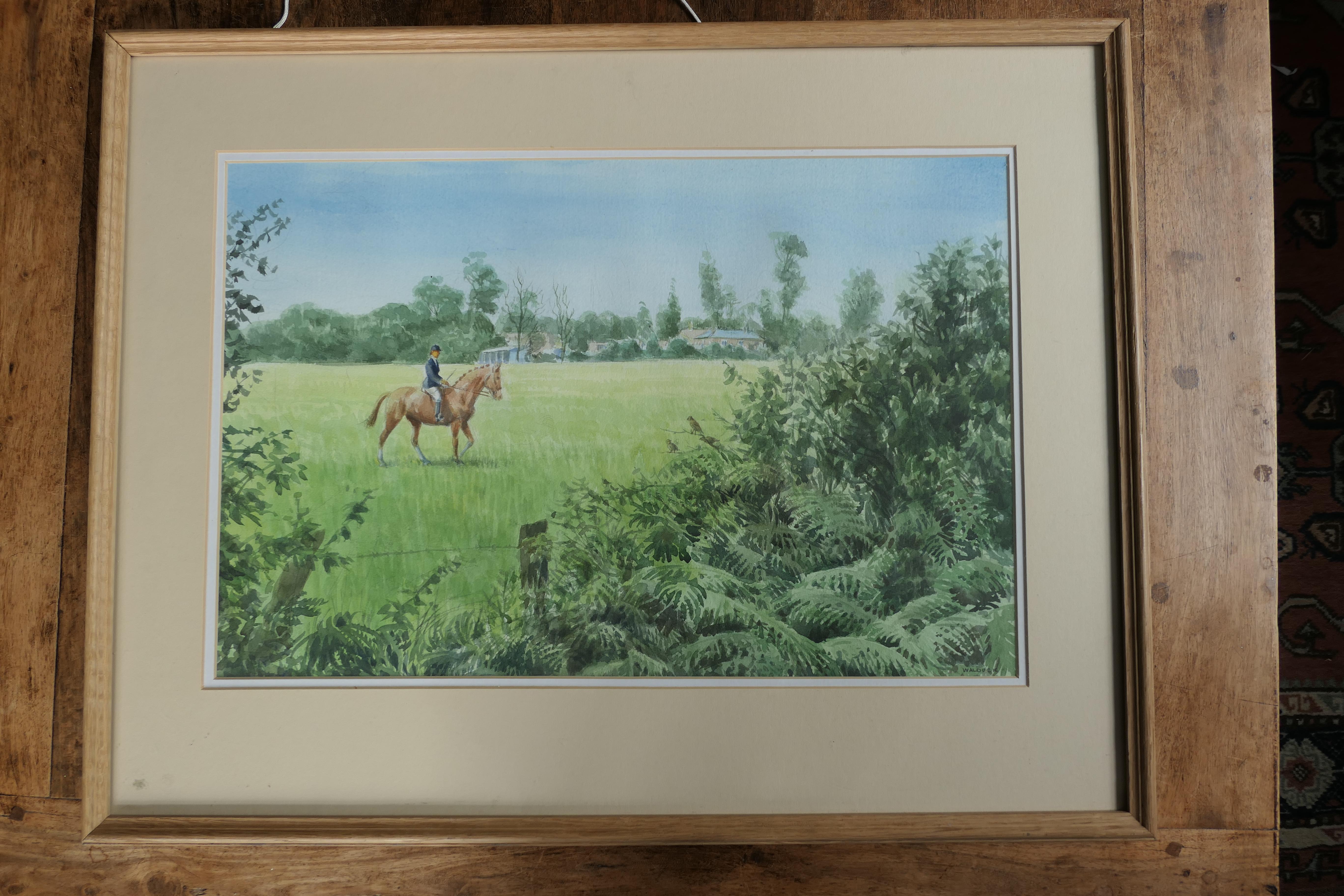 
Framed and Glazed Ink and Watercolour by Desmond Walduck 

Desmond Walduck is a comic book artist known for his work on Dan Dare 1920-1995
This painting is of A Horse Woman Riding By it is set in a moulded wooden, the painting is signed WALDUCK and