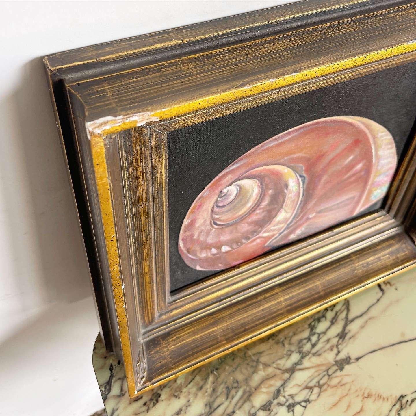 Discover the beauty of this exceptional vintage oil painting by Gauna. Featuring a stunning red iridescent nautilus shell, this framed and signed artwork adds a touch of elegance and sophistication to any space.

Exceptional vintage oil painting by