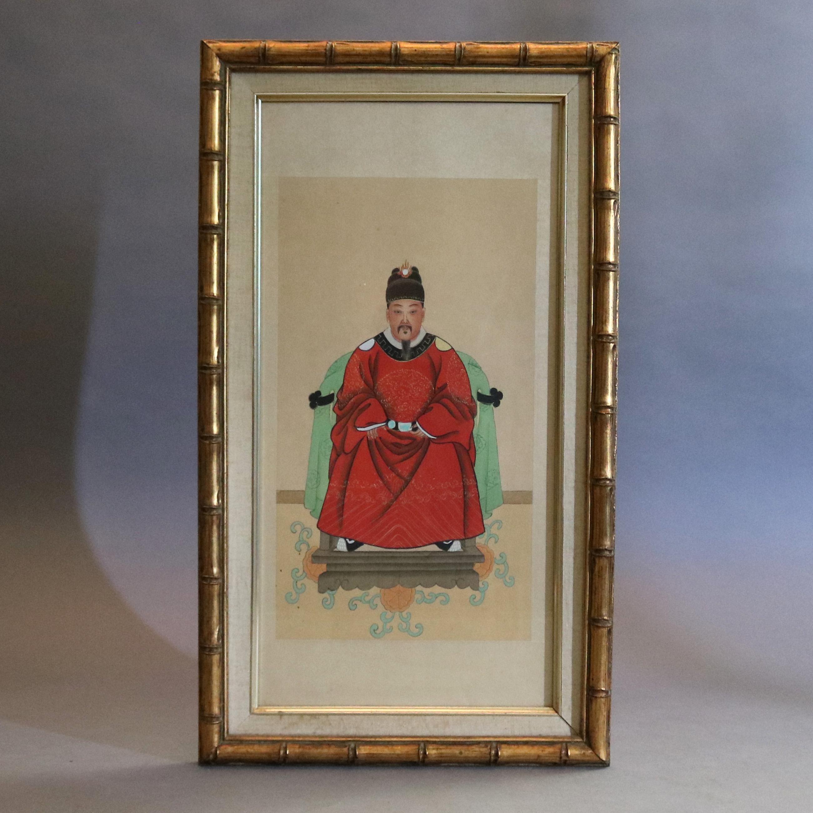 A pair of Chinese ancestral portrait prints depict man and woman seated and in traditional formal attire, framed in bamboo form gilt surround, circa 1920

Measures: 28.25