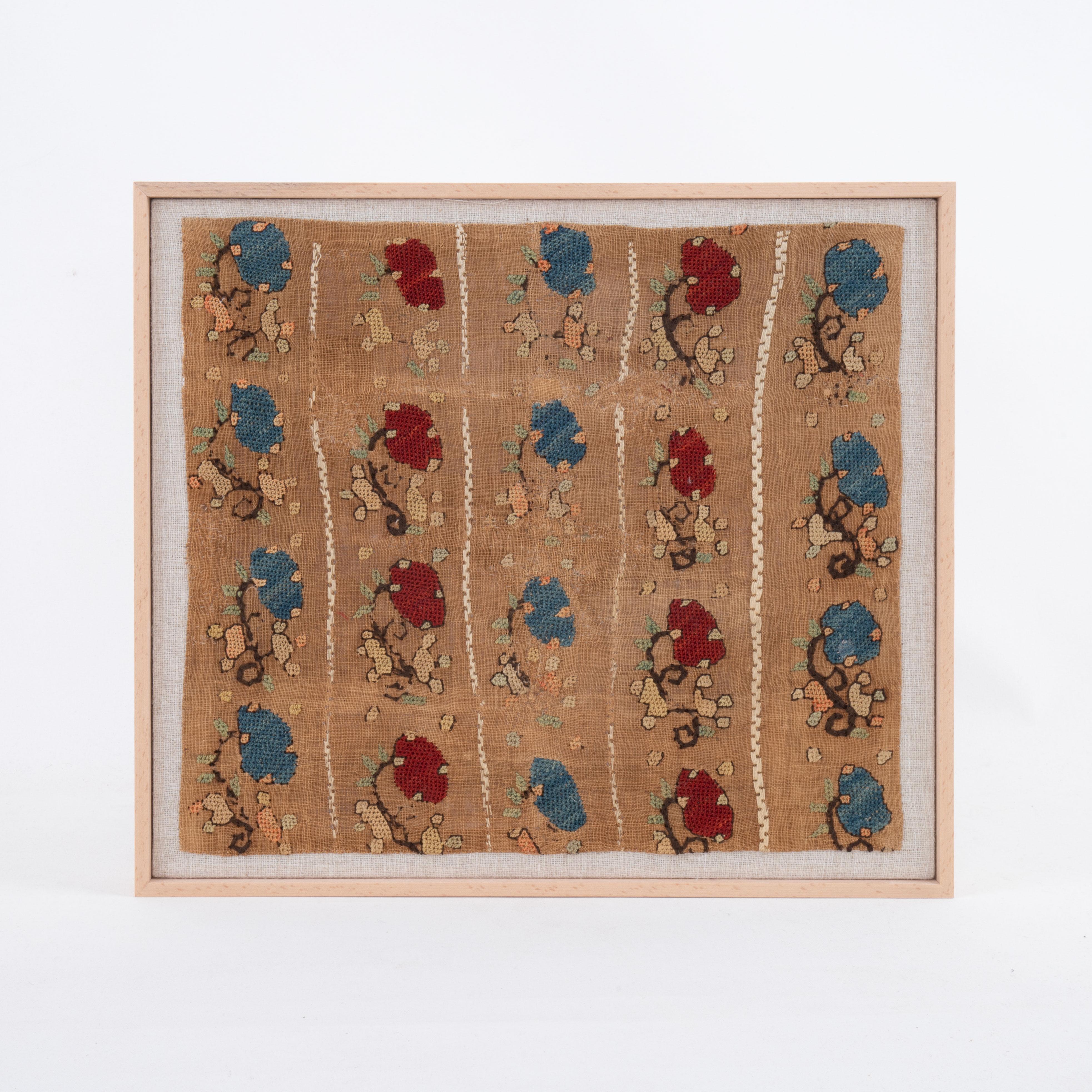 First the fragment has been hand backed on a linen fabric, then stretched over a wooden stretcher and finished with a wooden frame.
 19th C. Turkey
Ready to go on a wall.

Framed Item above is made from a used and antique embroidery therefore it i