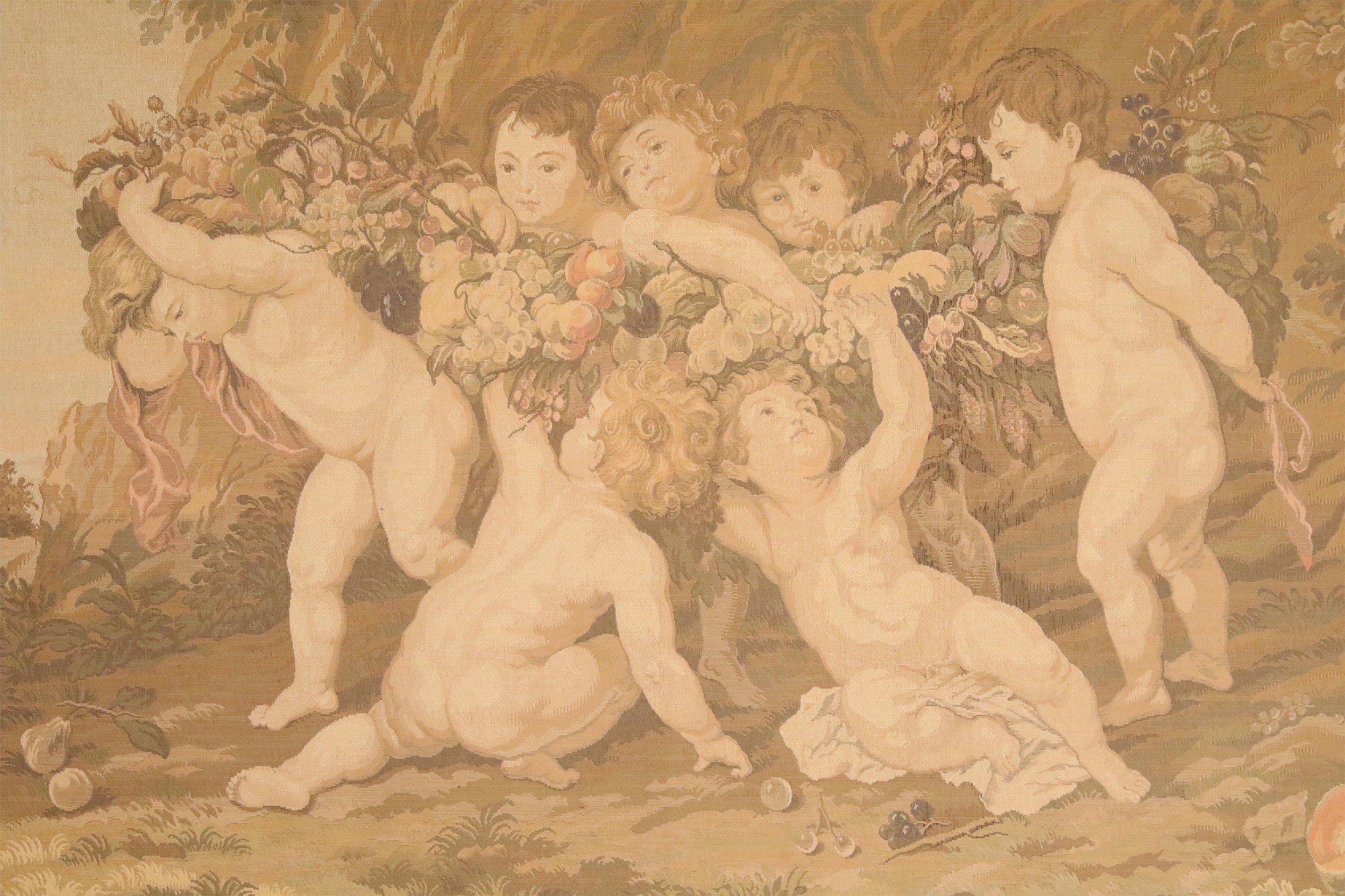 French (19th-20th century) beige and brown tapestry depicting a scene of several cherubs on a forest hillside in a rectangular wooden frame.