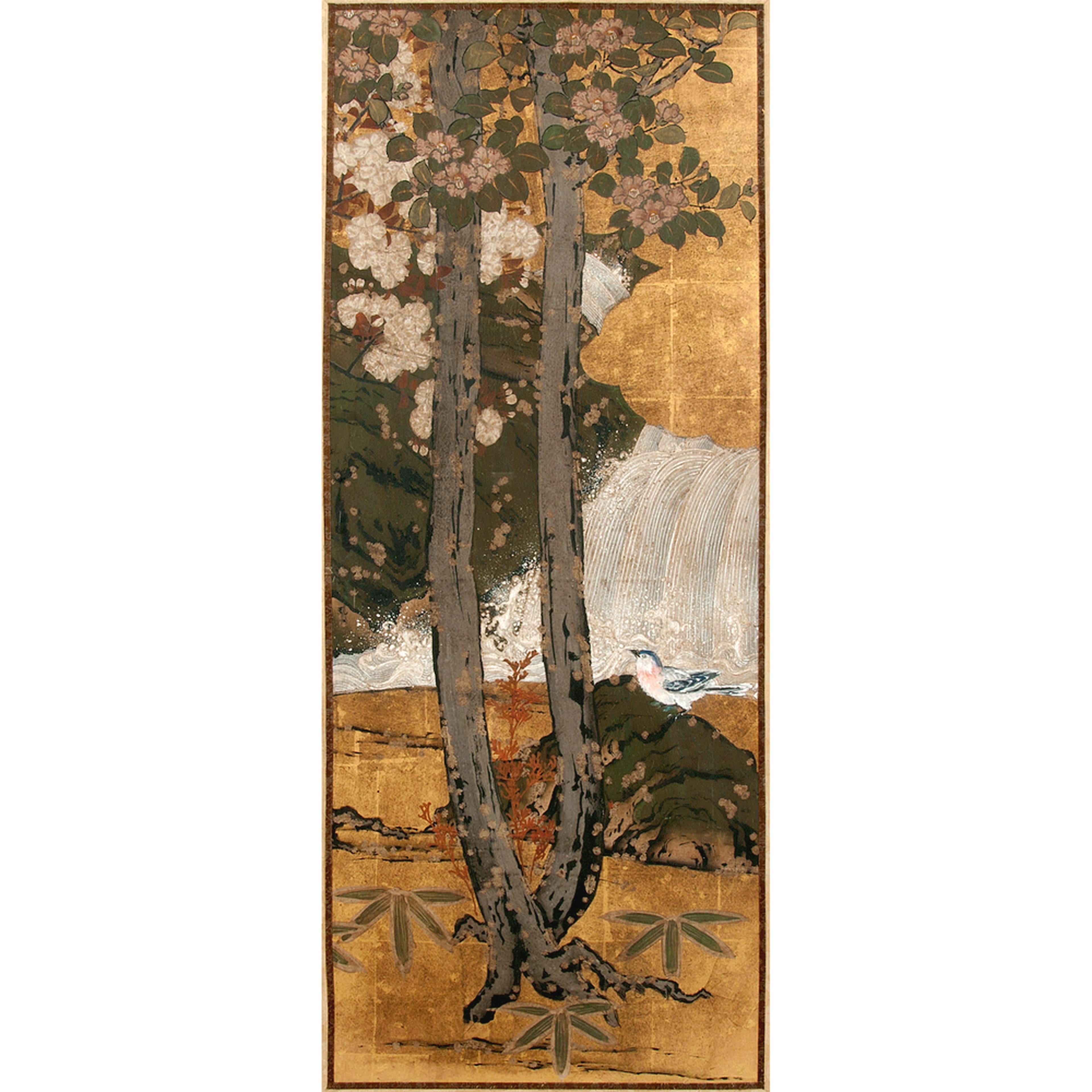 Framed Japanese landscape painting circa 1830s, the late Edo Period, possibly a panel from an antique floor screen. The painting was executed in the Rimpa style, depicting a tranquil forest scene with two towering magnolia trees in duel color