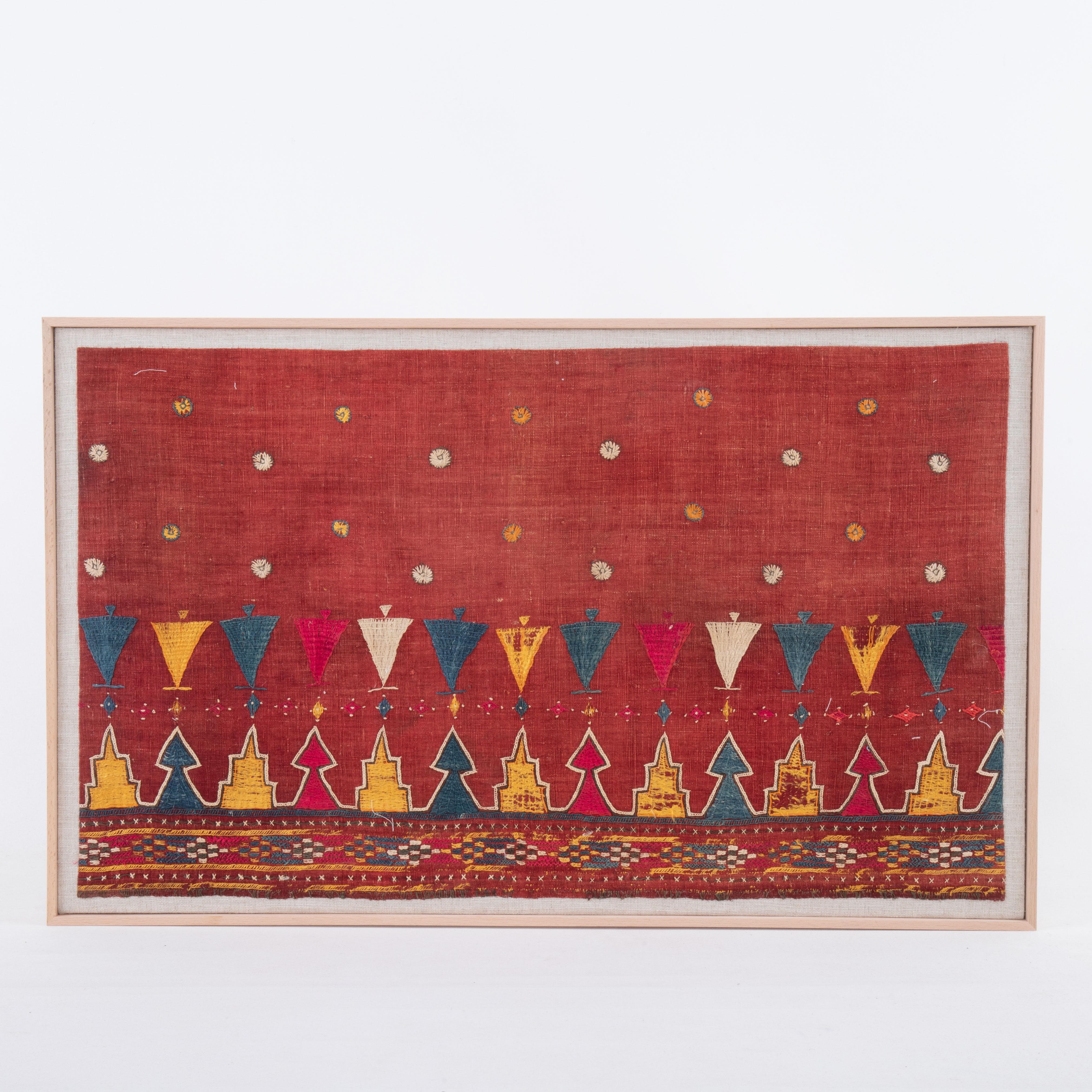 First the fragment has been hand backed on a linen fabric, then stretched over a wooden stretcher and finished with a wooden frame.
Early 20th C. India
Ready to go on a wall.

Framed Item above is made from a used and antique embroidery therefore it