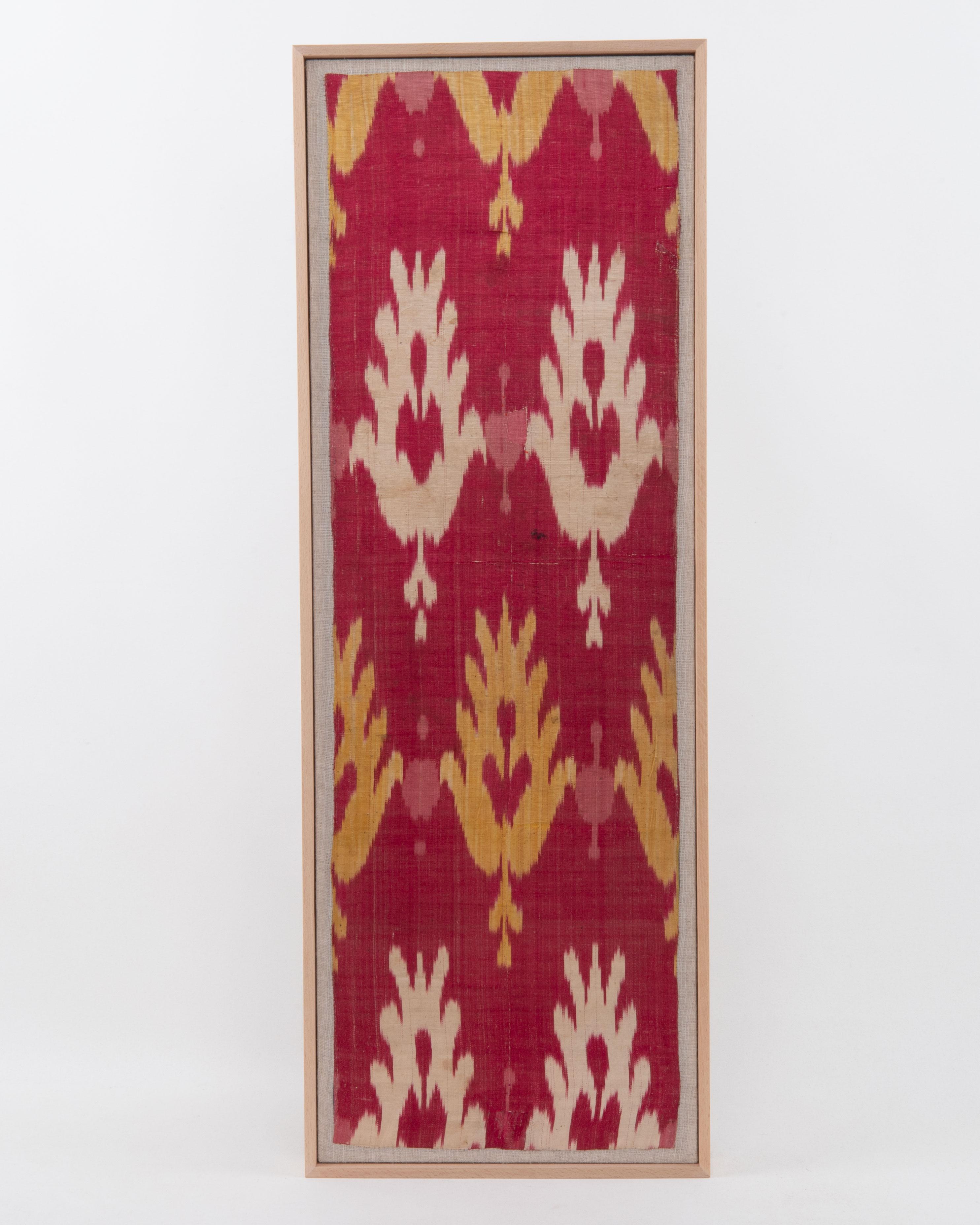 First the fragment has been hand backed on a linen fabric, then stretched over a wooden stretcher and finished with a wooden frame.
Late 19th C. Tajikstan
Ready to go on a wall.

Framed Item above is made from a used and antique embroidery therefore