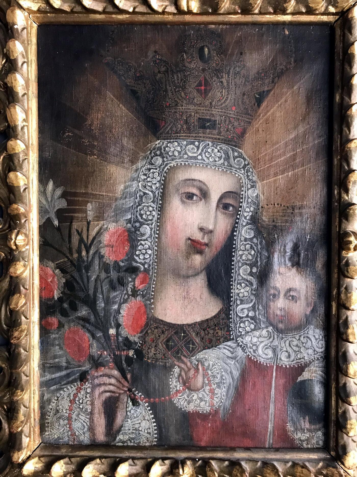 A lovely antique oil on linen painting from Spanish Colonial period late 18th-early 19th century. In the style of Classic Cuzco School, the painting depicts Madonna and Baby Christ and were heavily embellished with symbols of Christianity influenced