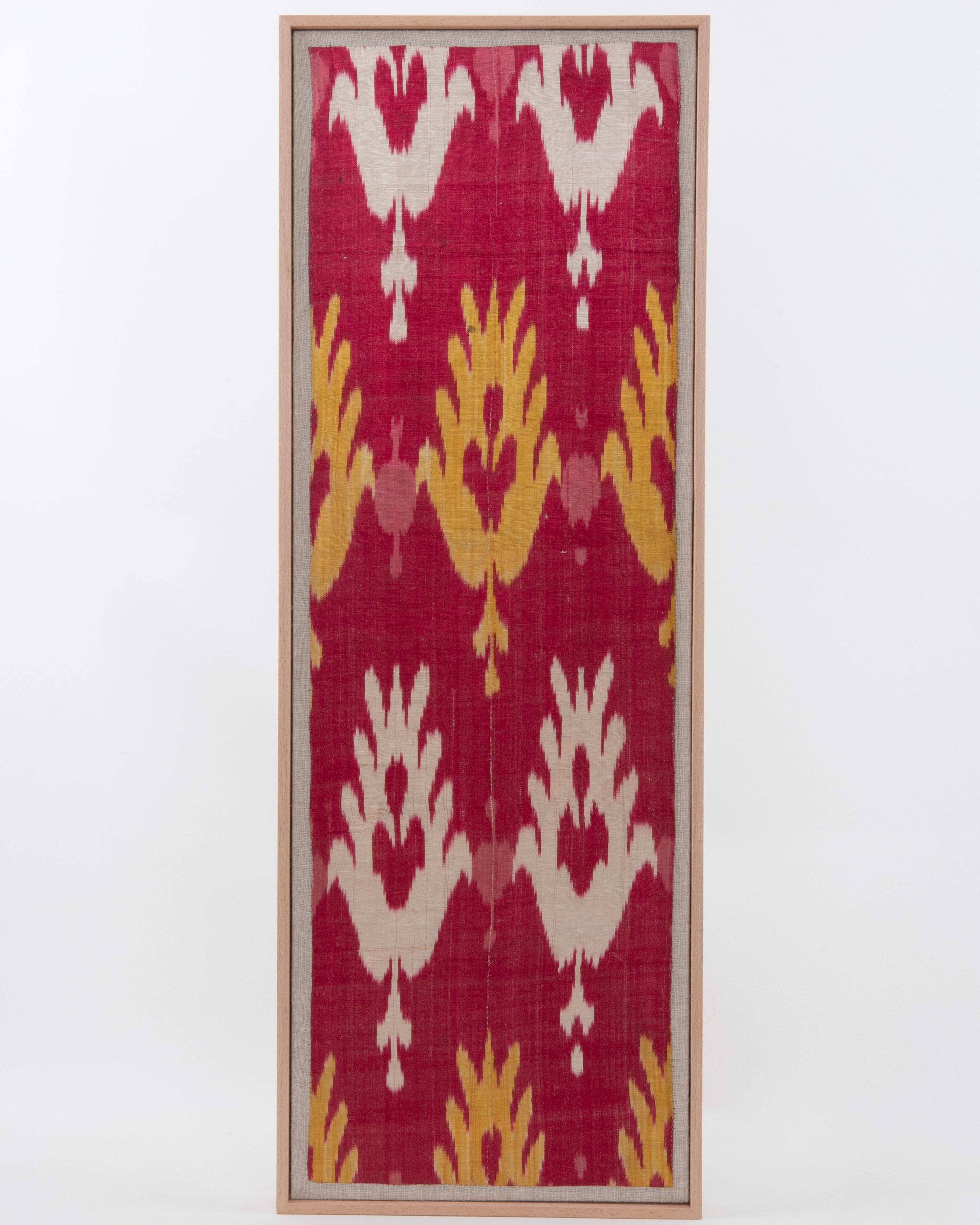 First the fragment has been hand backed on a linen fabric, then stretched over a wooden stretcher and finished with a wooden frame.
Late 19th C. Uzbekistan
Ready to go on a wall.

Framed Item above is made from a used and antique embroidery