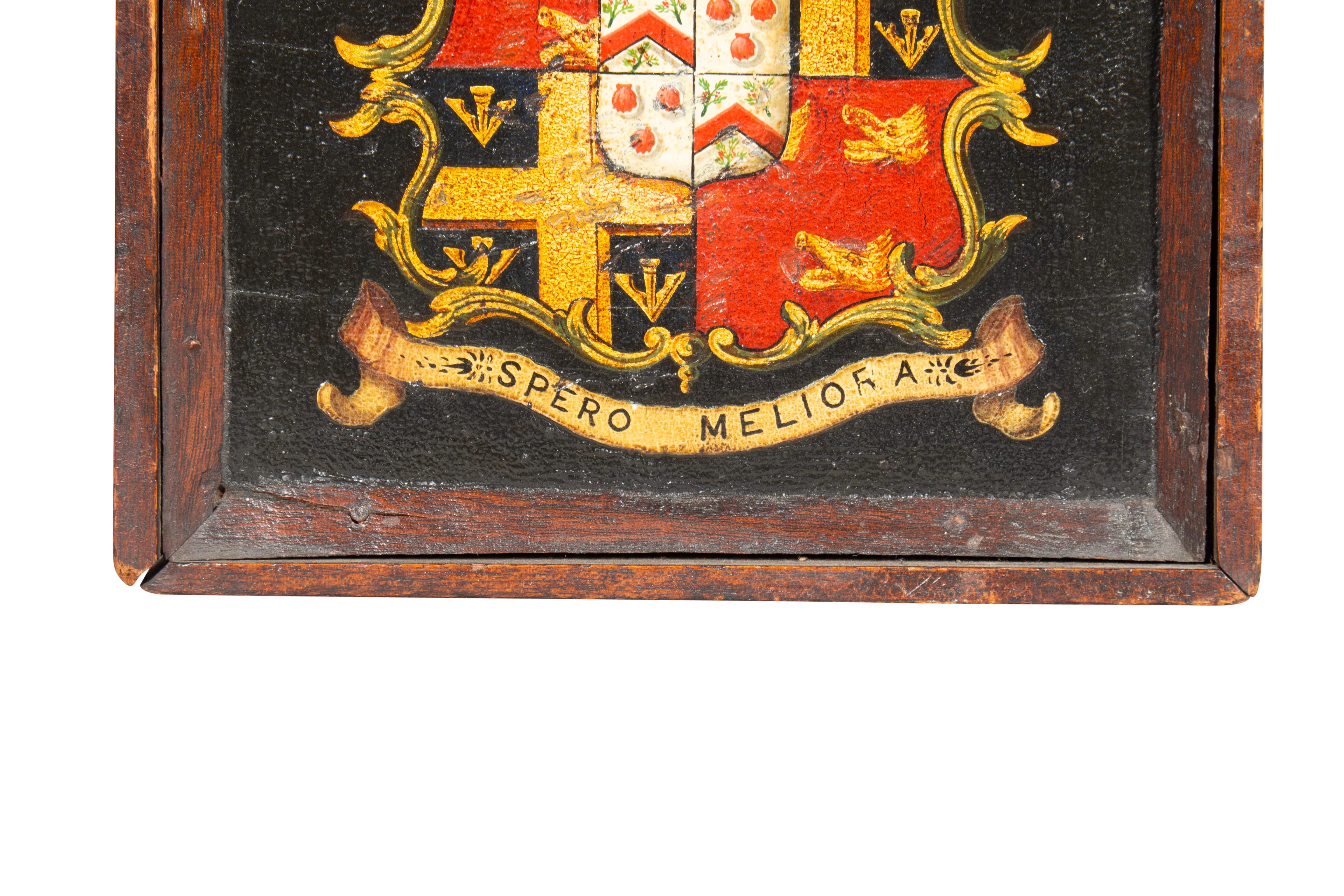 Framed crest with Latin inscription 