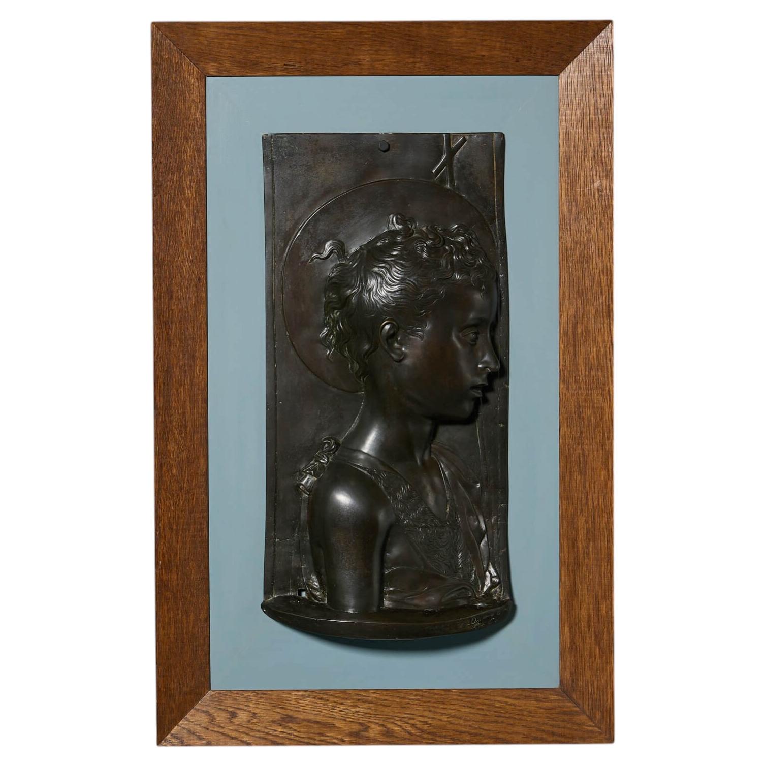 Relief en bronze encadré représentant St. Johns d'après Desiderio da Settignano