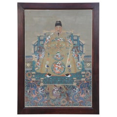 Portrait d'ancêtre chinois encadré représentant un homme en robes d'or
