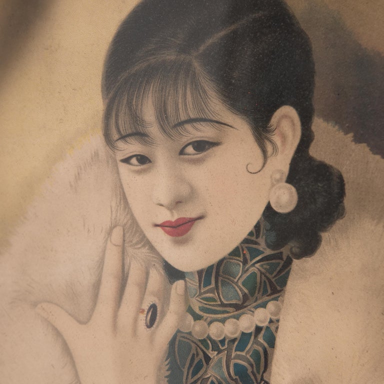 Influenced by Western advertising, commercial posters featuring beautiful women in modern settings gained popularity in China in the 1920s and 1930s. Commercial companies presented posters, like this one, to their clients for Chinese New Year. This