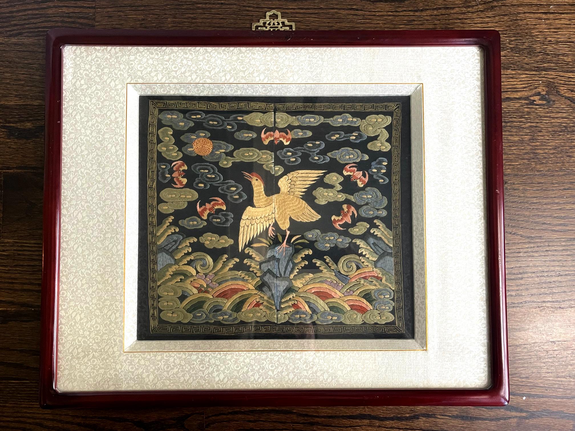 A finely embroidered silk civil rank badge panel framed in a wood frame circa late Qing dynasty 19th century. The square rank badge is known in Chinese as Buzi which was displayed in the front and back of the official robe to indicate one's rank