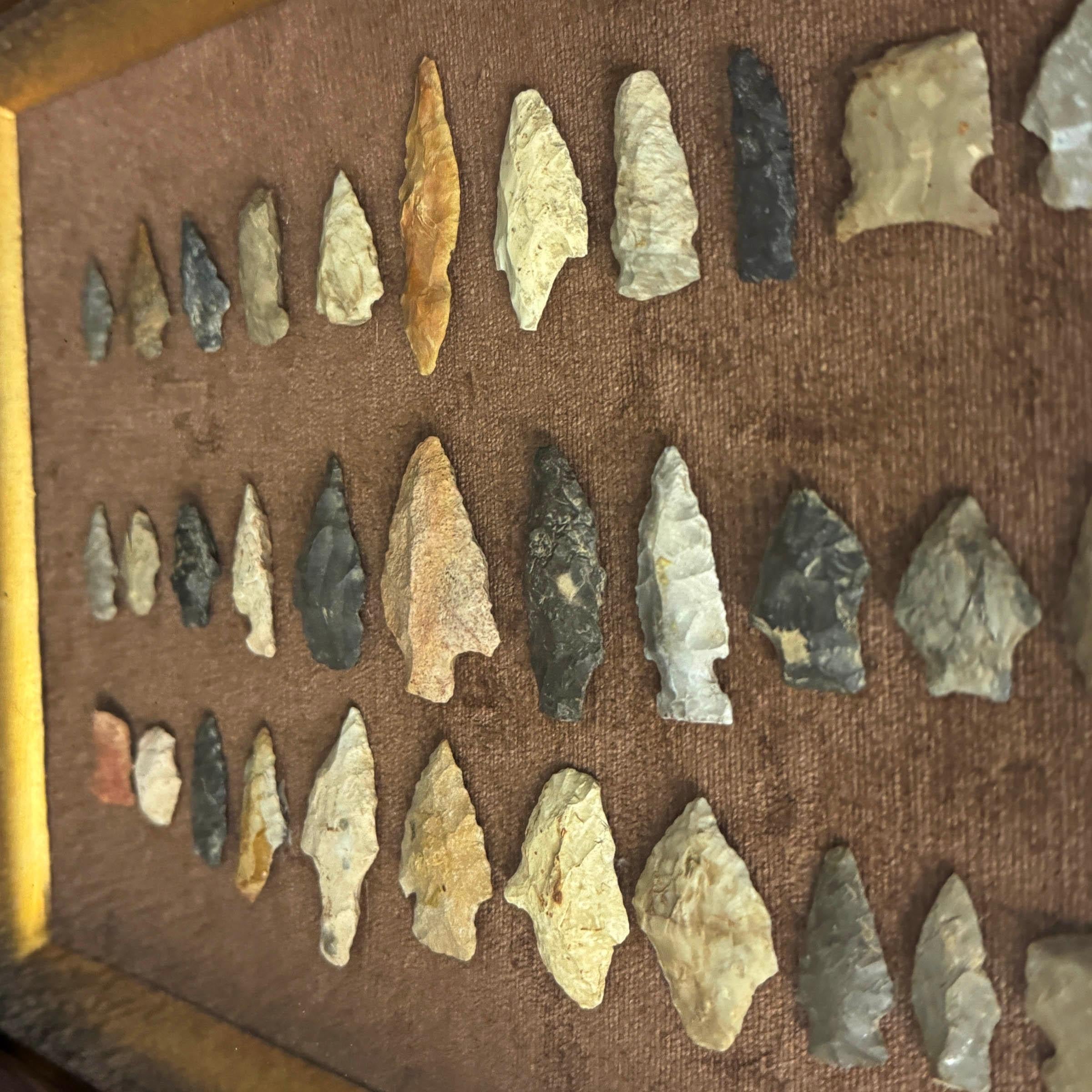 Stone Framed Collection of Thirty-Three Native American Arrowheads For Sale