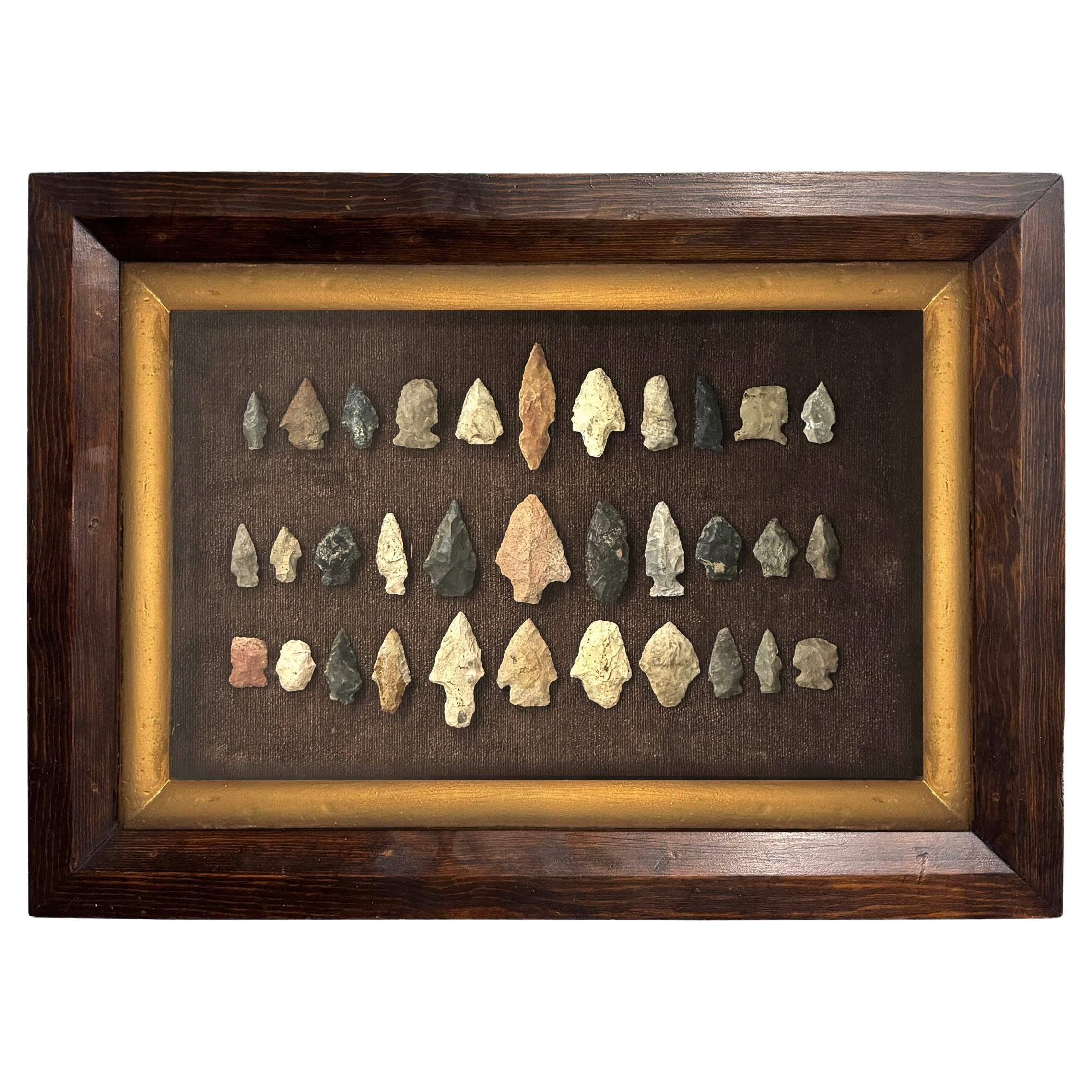 Framed Collection of Thirty-Three Native American Arrowheads For Sale