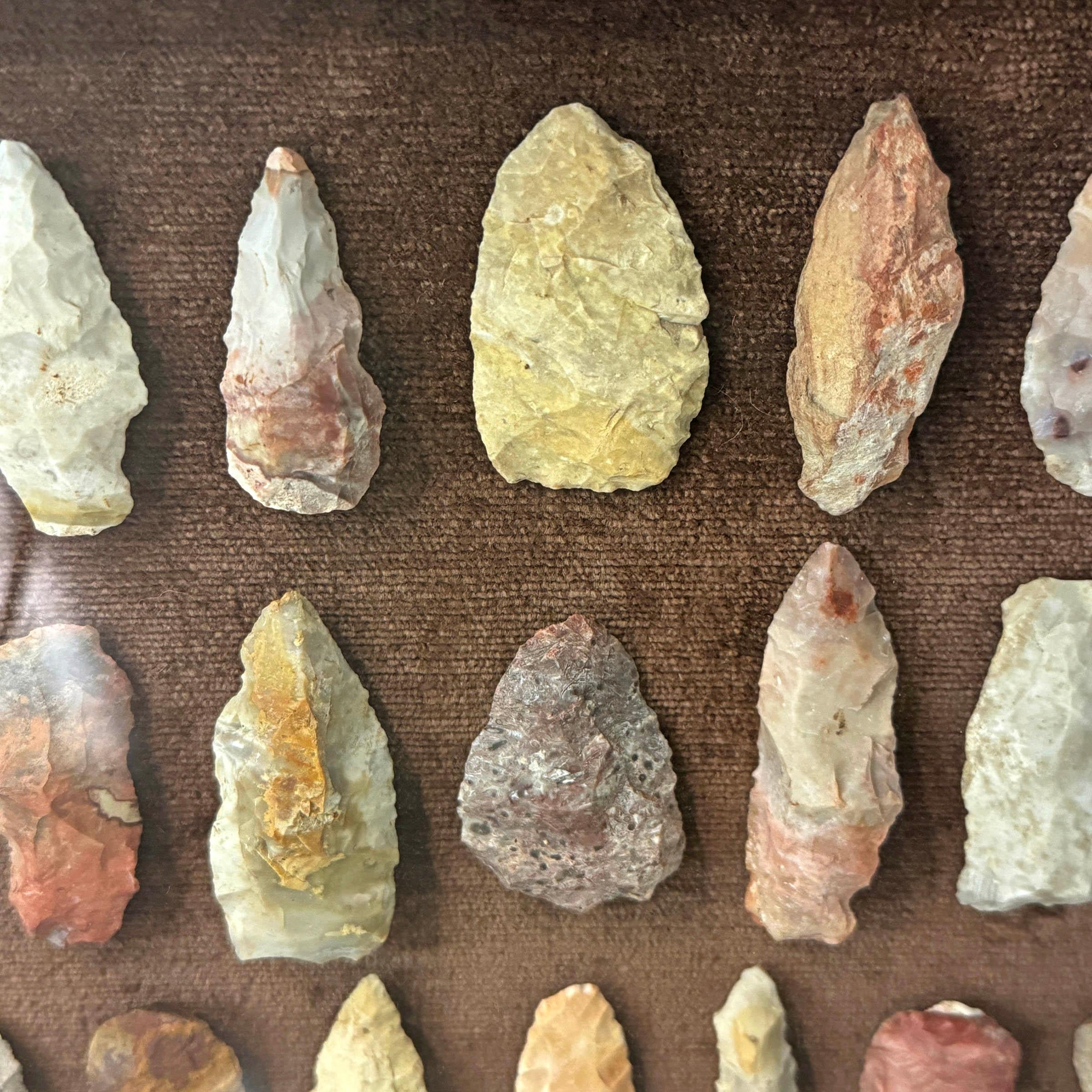 Stone Framed Collection of Twenty-One Native American Arrowheads For Sale