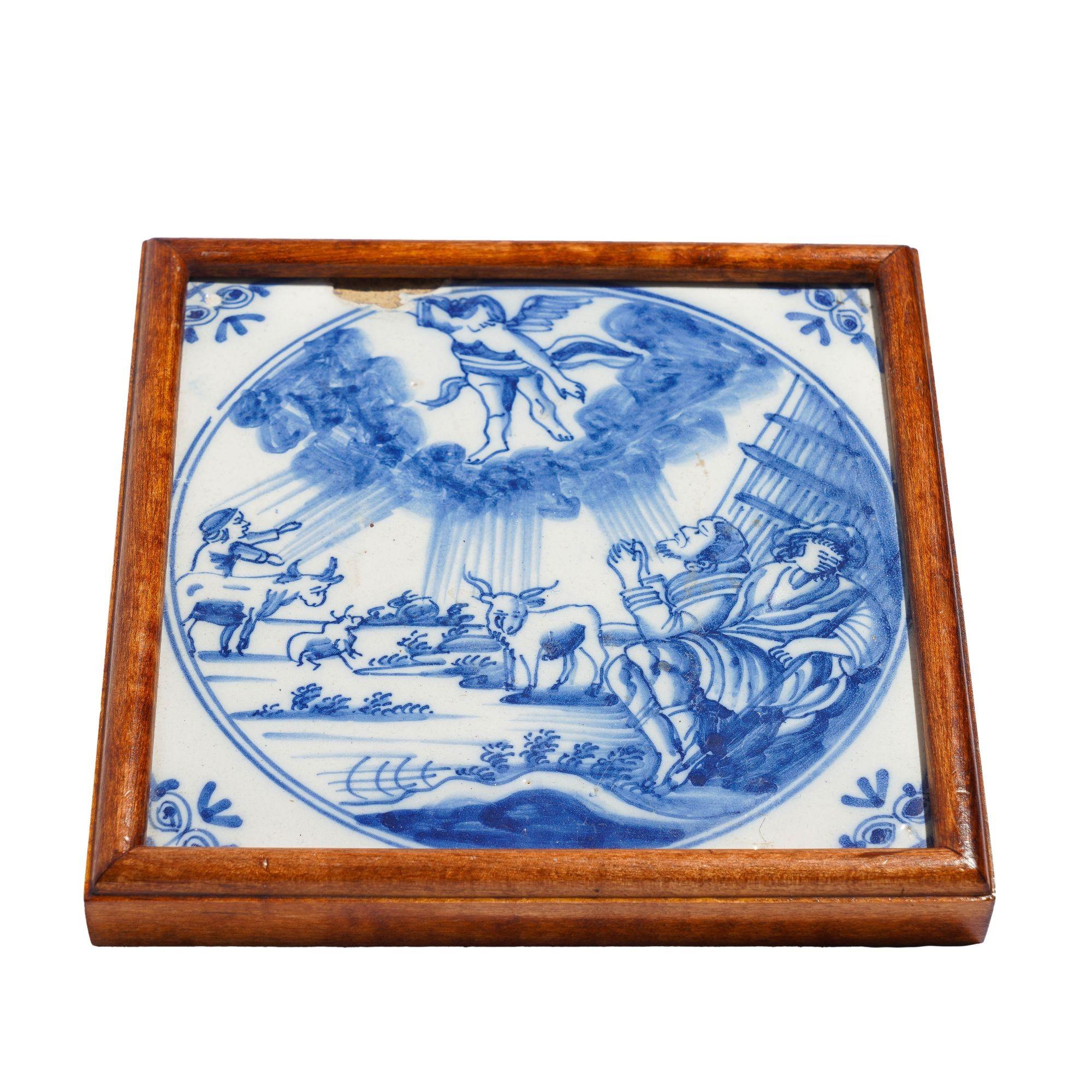 Delft tile depicting of the Annunciation, mounted in a hard wood bead molding. Fitted with a leather backing.
Netherlands, 17th century.

Dimensions: 5-1/4” W x 5-1/4” L x 3/4” D
