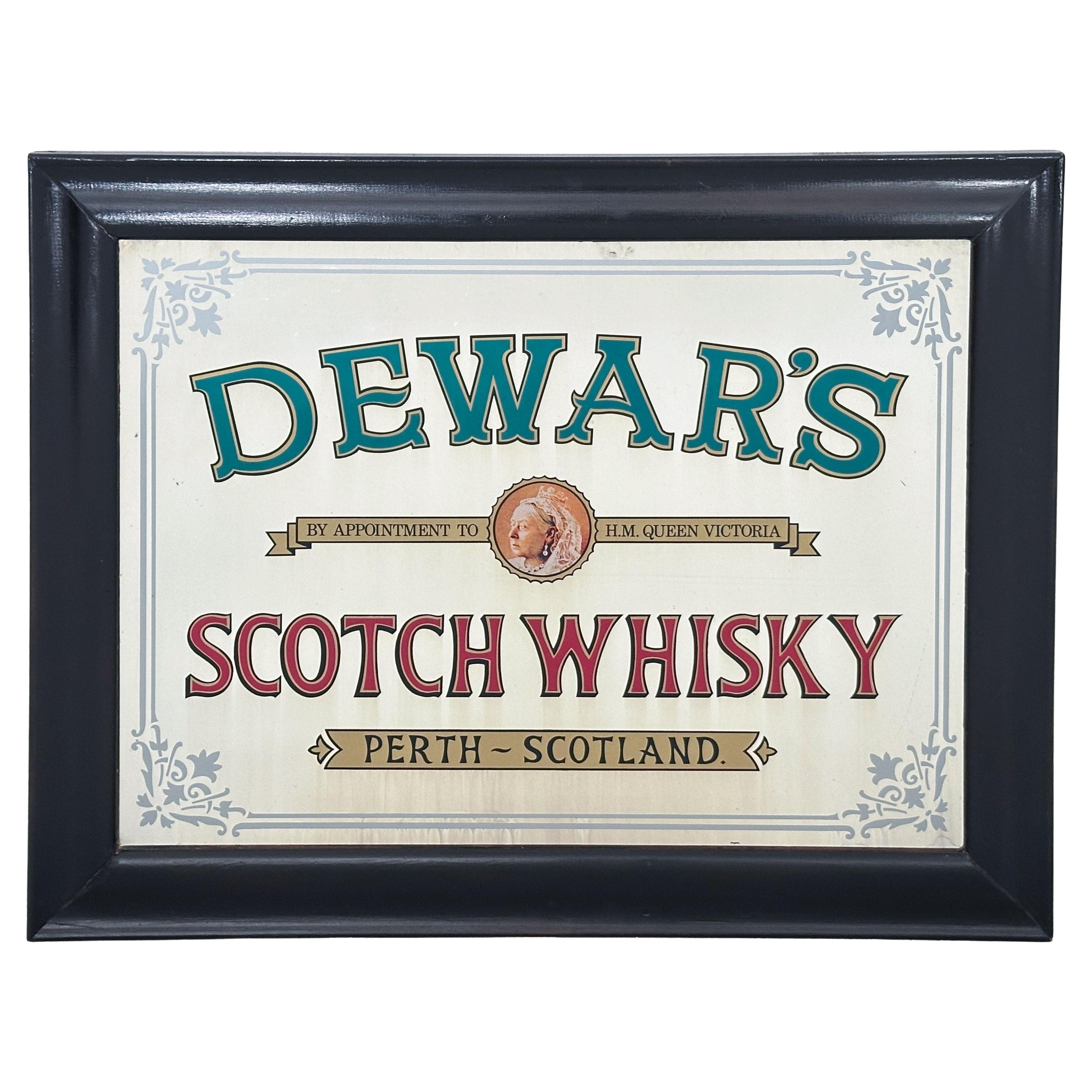 Specchio con cornice per la pubblicità del whisky Dewar's dalla Scozia (H. 25 1/4 x L. 32)
