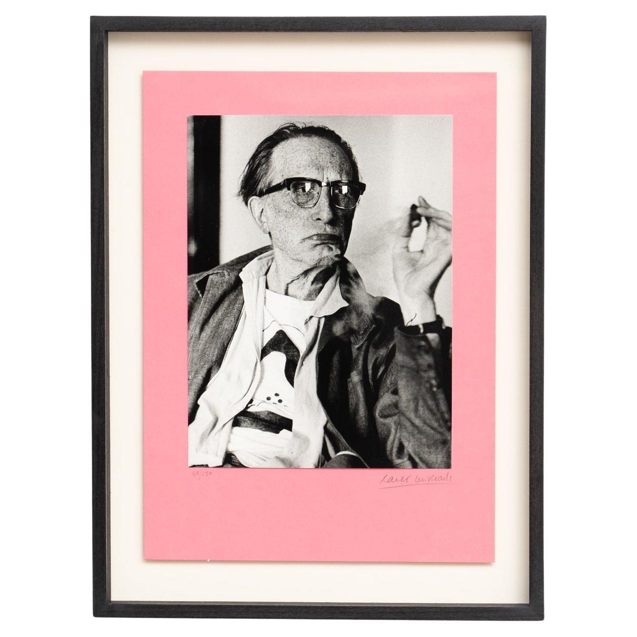 Framed Duchamp-Rrose da Cadaqués Photo by Xavier Miserachs - Signed and Numbered

Acquire a rare and captivating piece of photographic art with this black and white limited edition photograph by Xavier Miserachs, featuring a portrait of Marcel