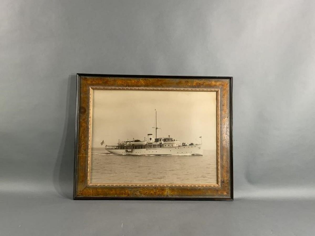 Large framed photo print from the studio of Edwin Levick of motor yacht 