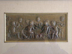 Framed Embossed Bronze of 9 Cherubs Dining with a Dog, Signed and Dated 1902