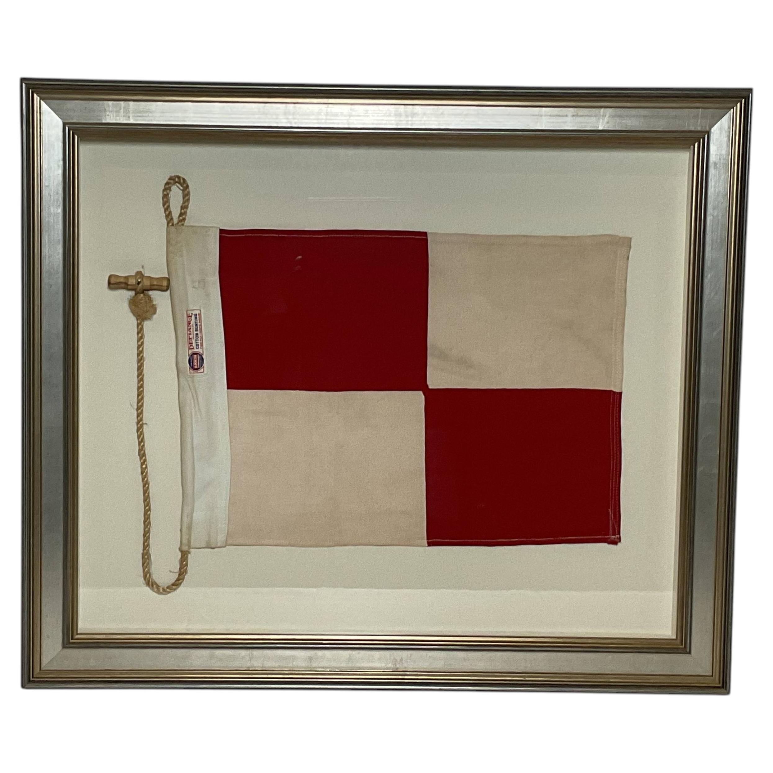 Bandera de lino enmarcada con el Código Internacional de Señales (U)