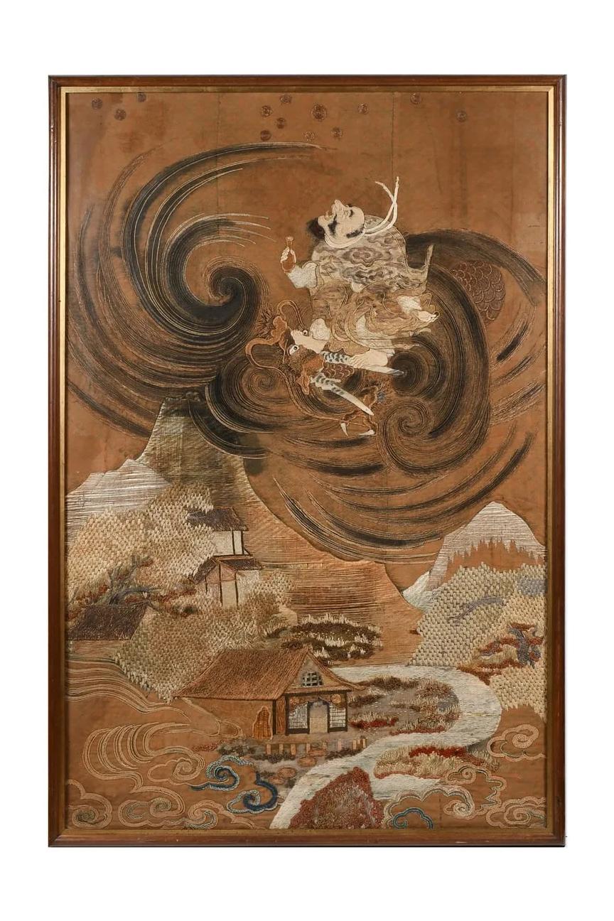 A stunning Japanese embroidery tapestry circa 1880s-1900s from late Meiji period, presented with an original wood frame with inner gold trim. The tour-de-force embroidered tapestry showcases a dramatic pictorial in which Tekkai Sennin intertwines