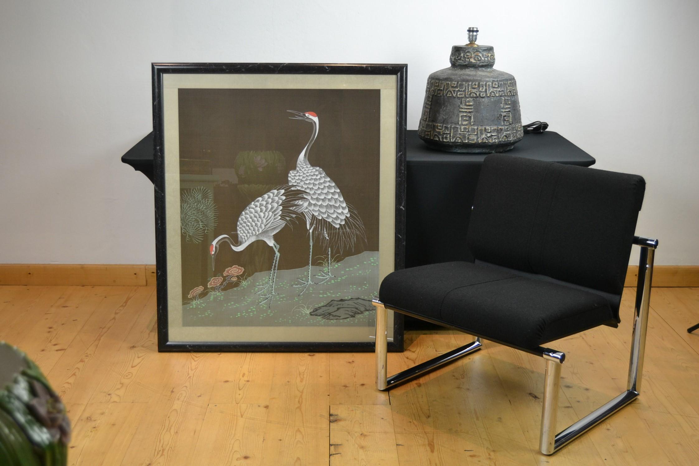 Bird artwork on silk with red crowned cranes or manchurian cranes.
This large and stylish framed work with two Japanese crane birds will look great in your interior. 
It's stylish wall decoration with a landscape scene with two crane birds and