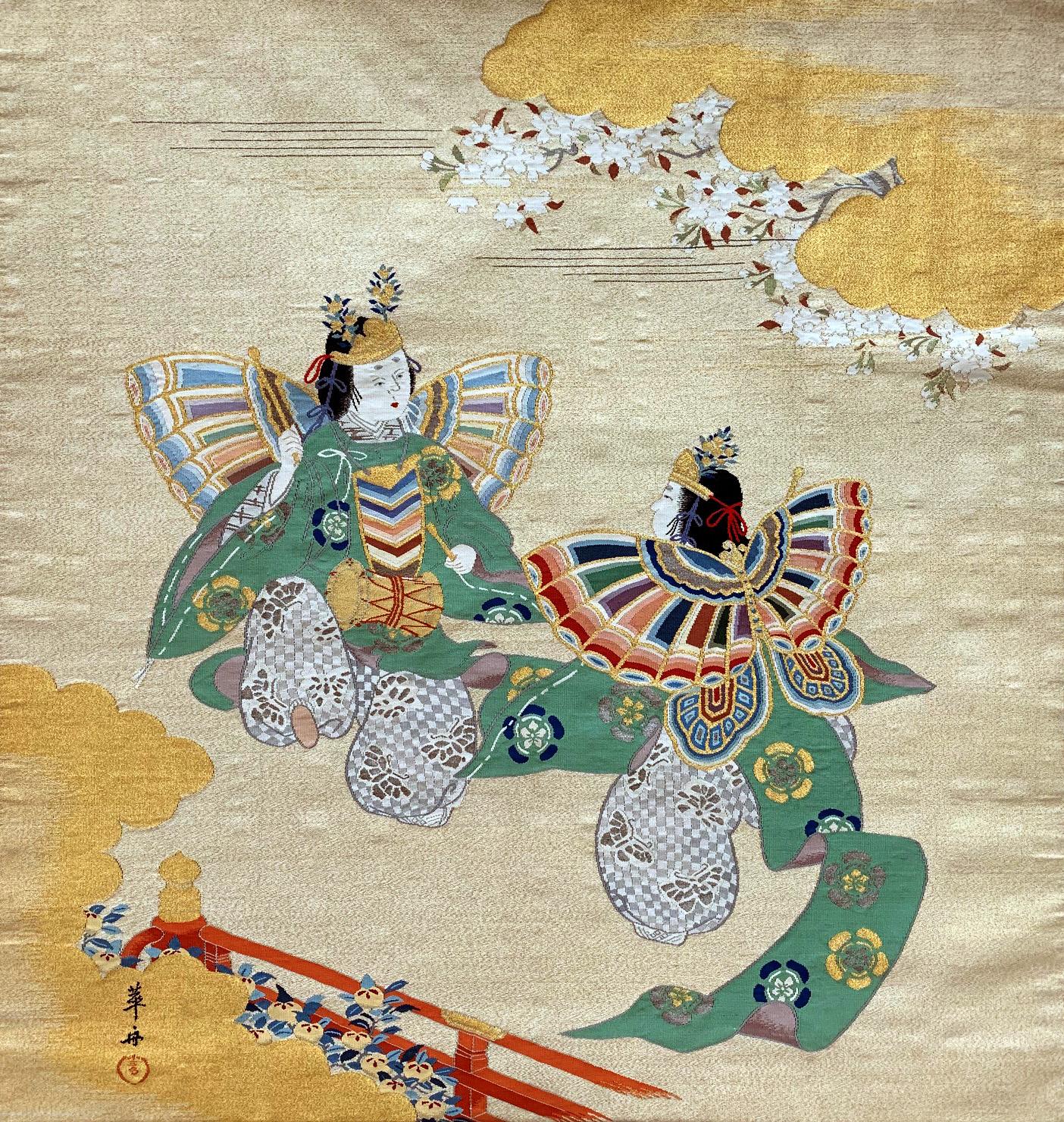 A Japanese Fukusa textile panel circa late 19th-early 20th century of Meiji Period. On the woven brocade background with gold thread forming clouds and mist, the main composition showcases two butterfly dancers in embroidery with great details and