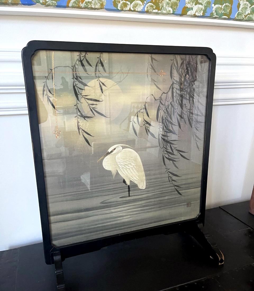 A Japanese decorated silk panel that was framed and made into a fireplace screen. Great care of taken by expert hands to create this panel by using a combination of Yuzen resist dye, painting and embroidery of couching stiches in gold threads. It