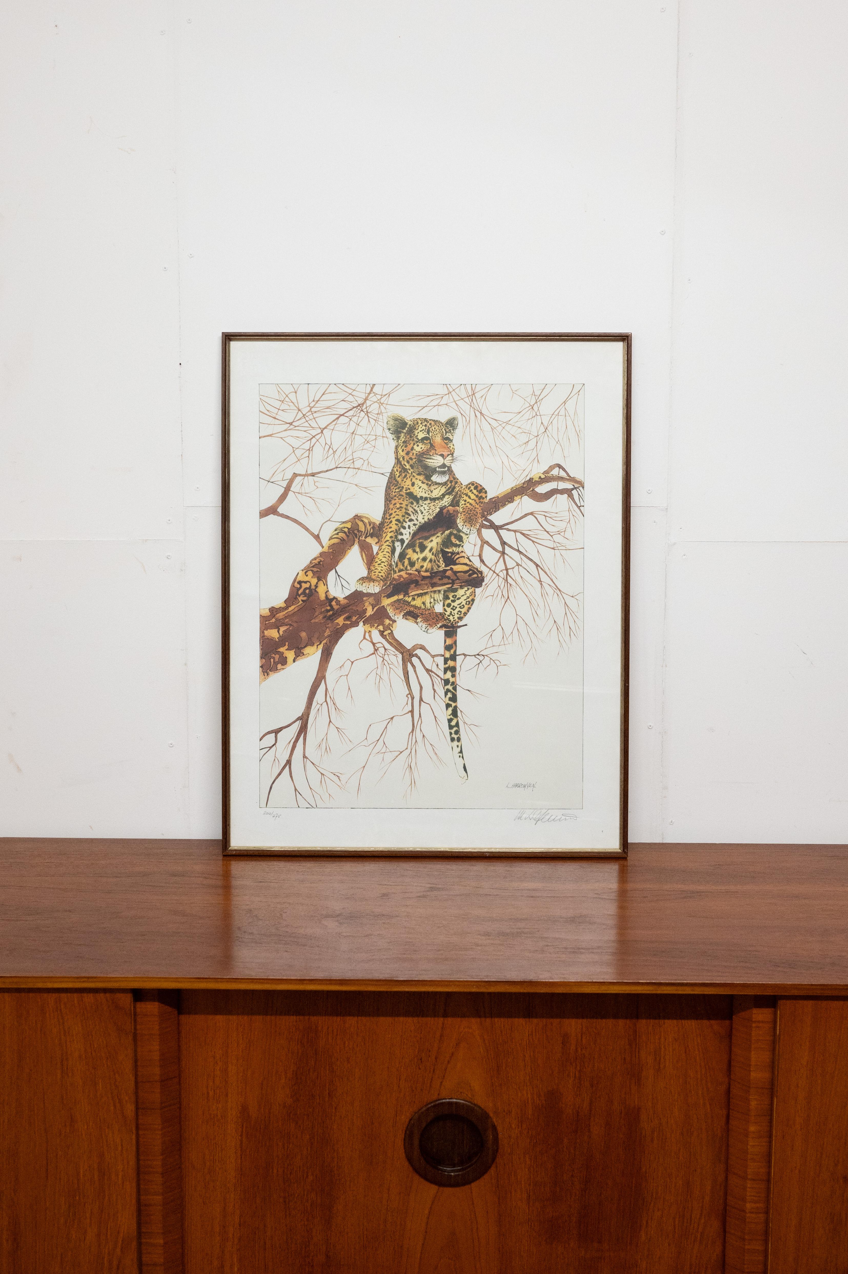 Elevate your space with a dash of wild charm and playfulness through this captivating print of a Leopard in a tree, a lively and captivating piece of art.
This print captures the essence of nature's most majestic feline, framed by the intricate