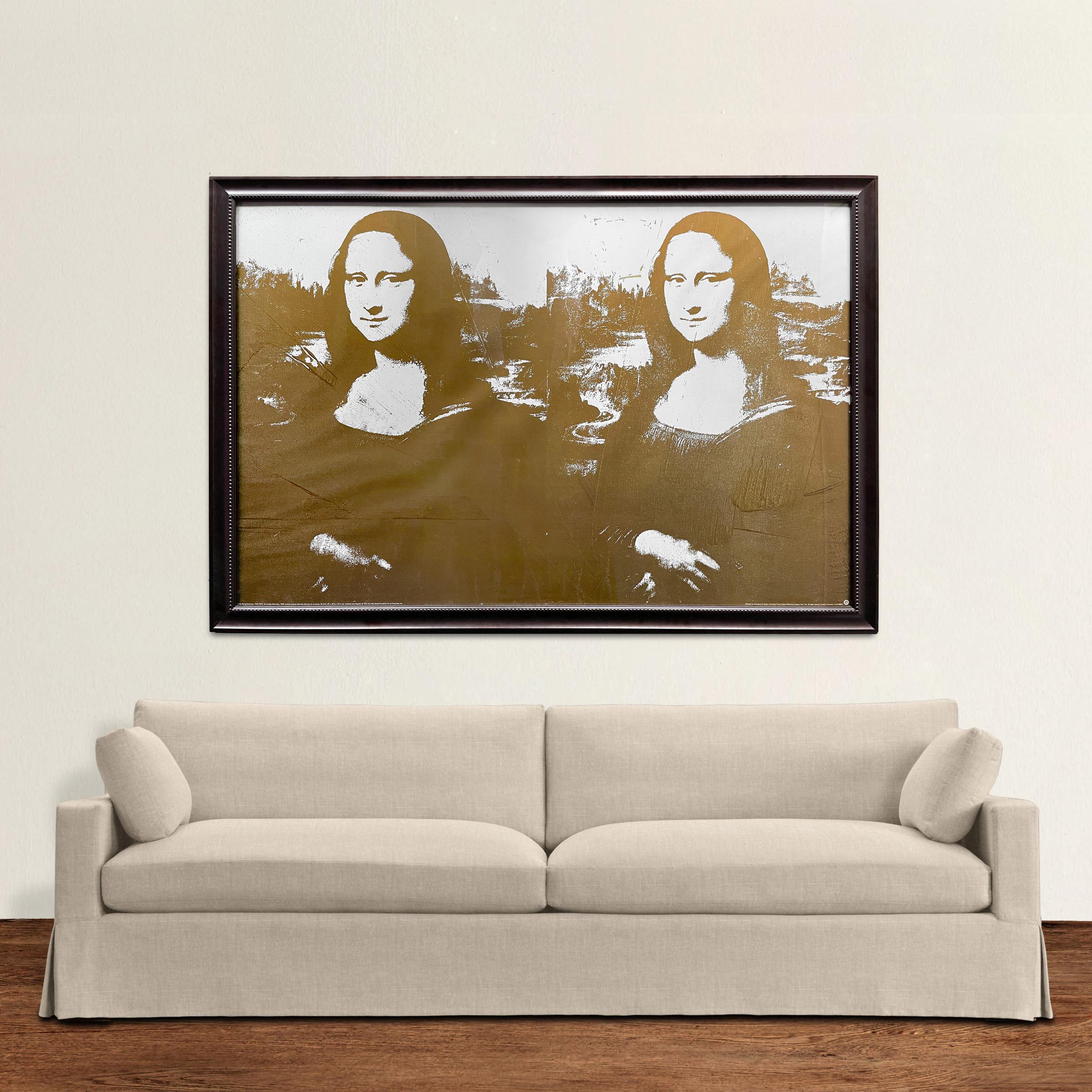 A striking limited edition 'Two Golden Mona Lisas' lithograph by Andy Warhol, printed by the Andy Warhol Foundation for the Visual Arts, Inc. in 1993. The original painting was complete by Warhol in 1980. The image is created using metallic ink on