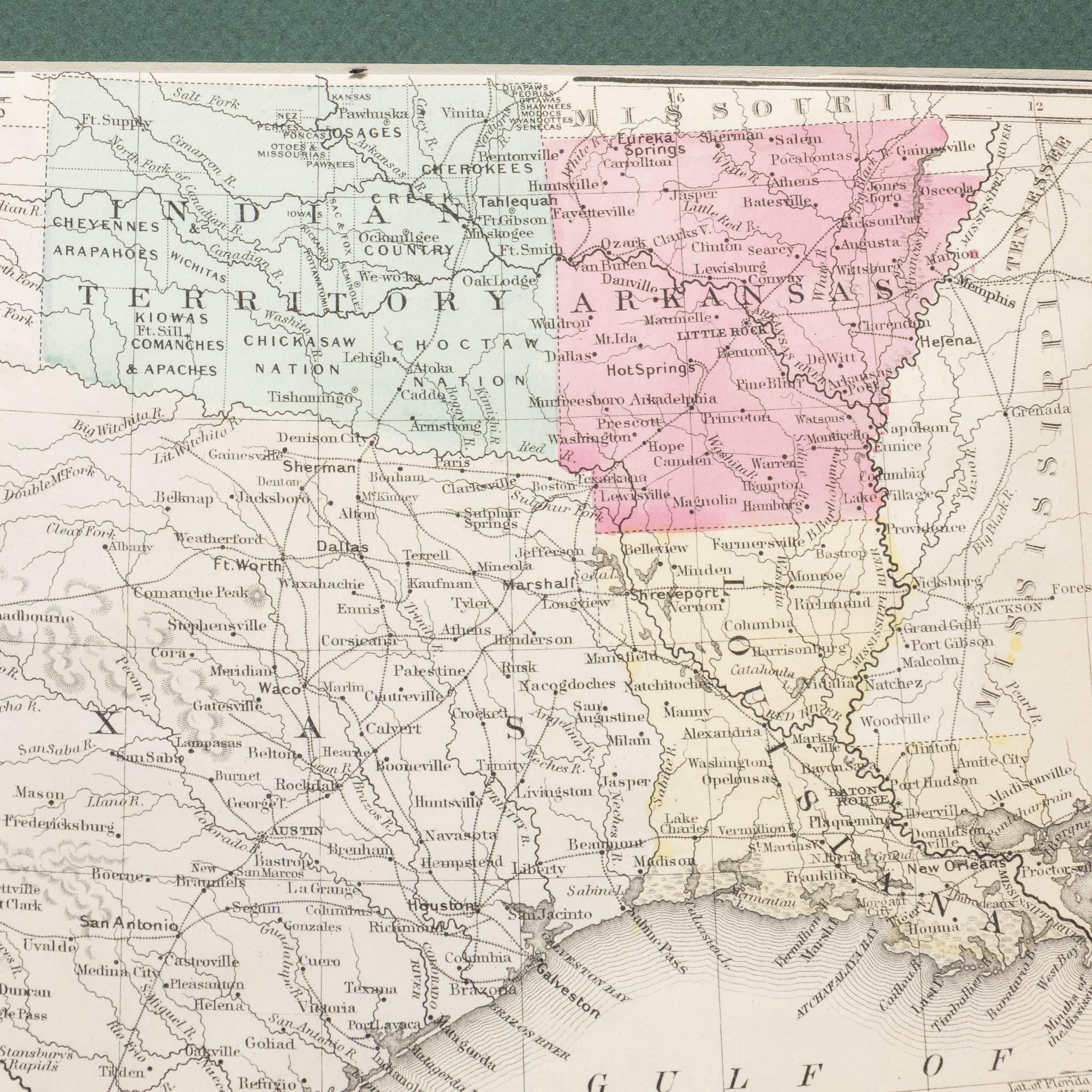 Framed circa 1886 map of Texas including Louisiana, Texas and Arkansas, with Indian territory. Well detailed. Great for display in any home. Encased in cherry and gold frame with dark green mating. Size:  10 1/2