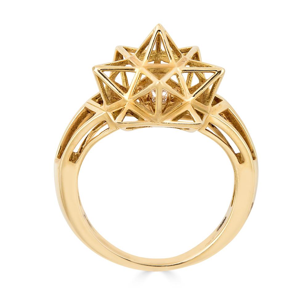 This airy, sculptural ring by John Brevard is inspired by sacred geometry, namely the star dodecahedron.  The Dodecahedron represents an idealized form of divine thought, will, or idea. To contemplate this symbol is to engage in meditation upon the