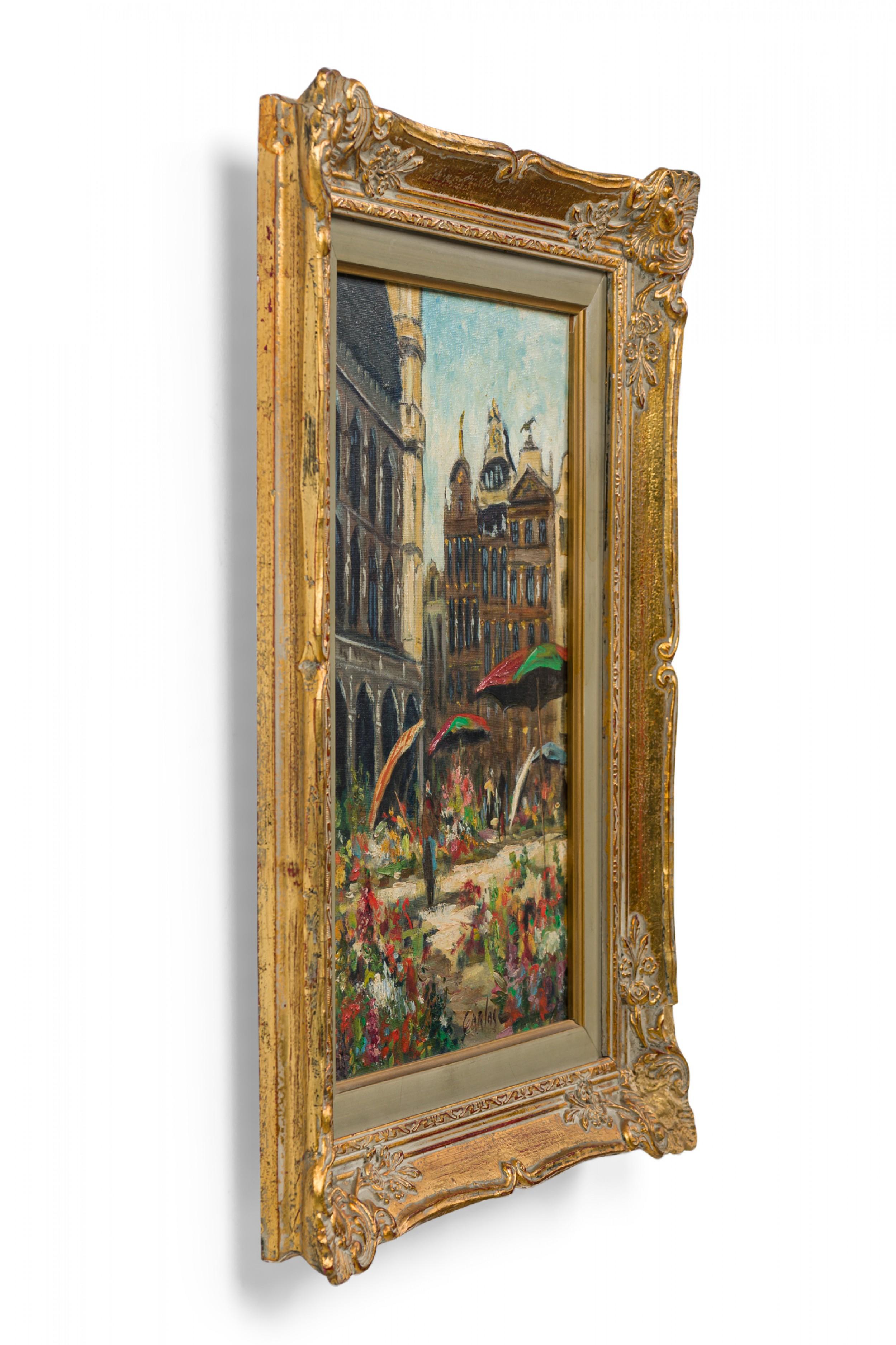 Mid-Century Italian genre scene oil painting on canvas depicting a plaza / street scene with blooming flowers and umbrella-shaded tables surrounded by buildings in a carved rectangular wooden frame.