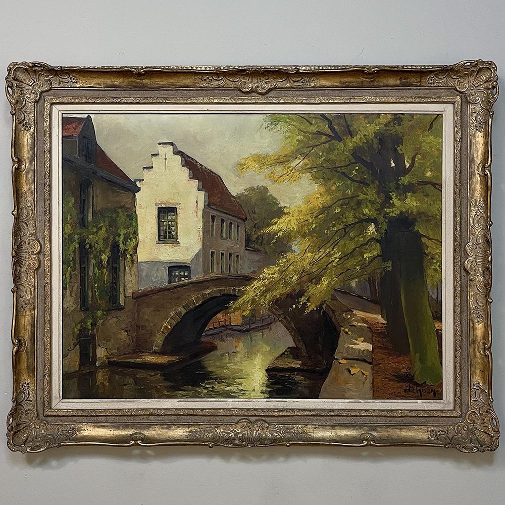 Framed oil painting on canvas by deMoen is yet another rendition of the storied city of Bruges, centuries ago a bustling port eventually eclipsed by Antwerp, and connected to other surrounding villages and cities with a complex system of man-made