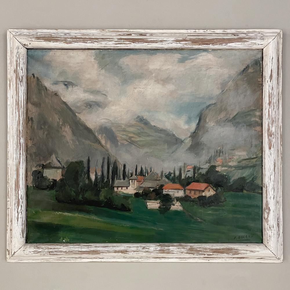 Framed Oil Painting on Canvas by Flory Roland (1905-1978) is a splendid view of the quaint little community of Bellecombe in the Savoie region, equidistant from Geneva and Grenoble nestled in a valley of the Alps not too far from the Italian border.