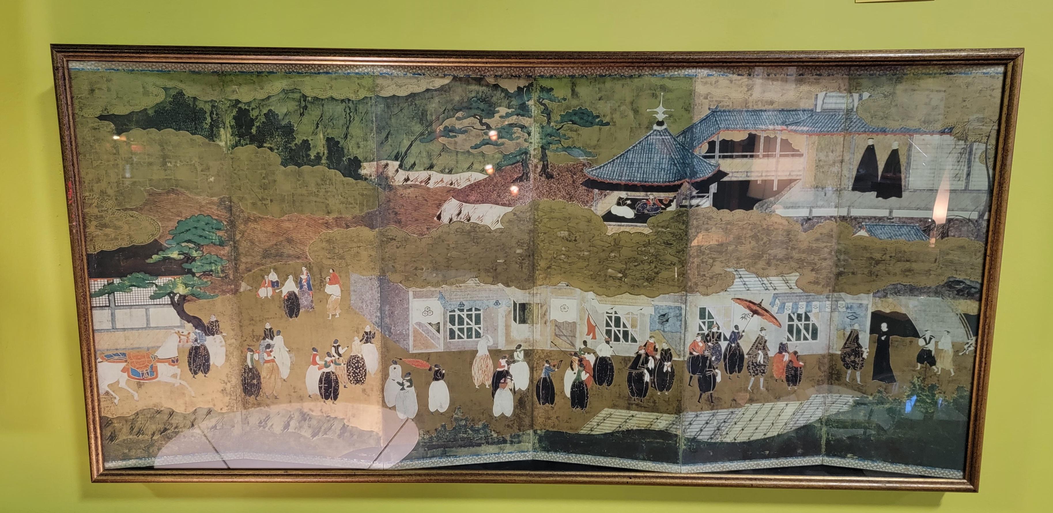 Asian folding panel or screen in shadow box frame. Appears to be Korean and hand painted. Depicting a village scene. Excellent original vintage condition. 